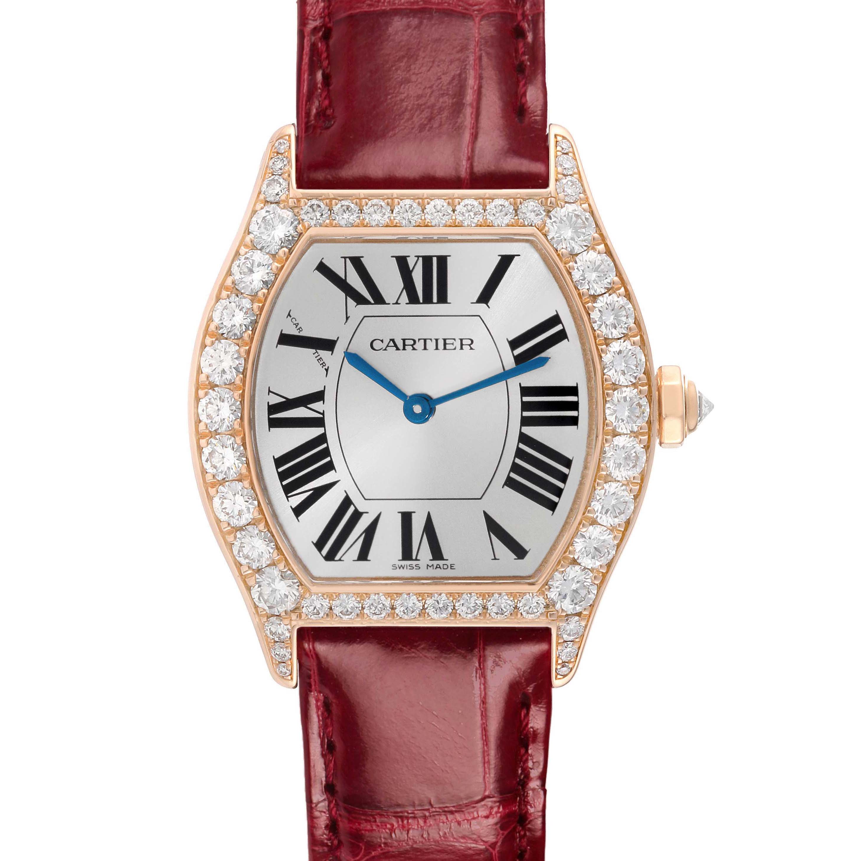 The Cartier Tortue WA507031 Women's Rose Gold Silver Dial watch is shown from the front, displaying its diamond-set bezel, Roman numeral dial, and burgundy leather strap.
