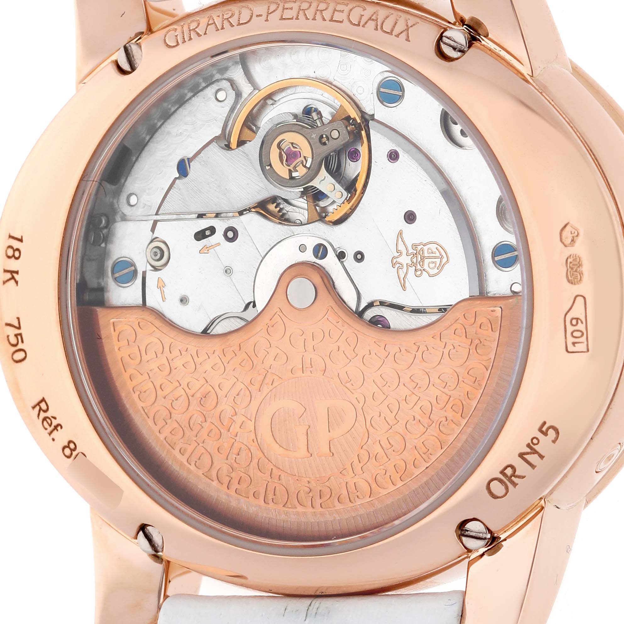 The image shows the back view of the Girard-Perregaux 80483D52A761-KK7A Women's Rose Gold Mother of Pearl Dial 80483D52A761-KK7A Women's Rose Gold Mother of Pearl Dial Cat's Eye Rose Gold Mother Of Pearl Diamond Ladies Watch 80483, revealing its movement.