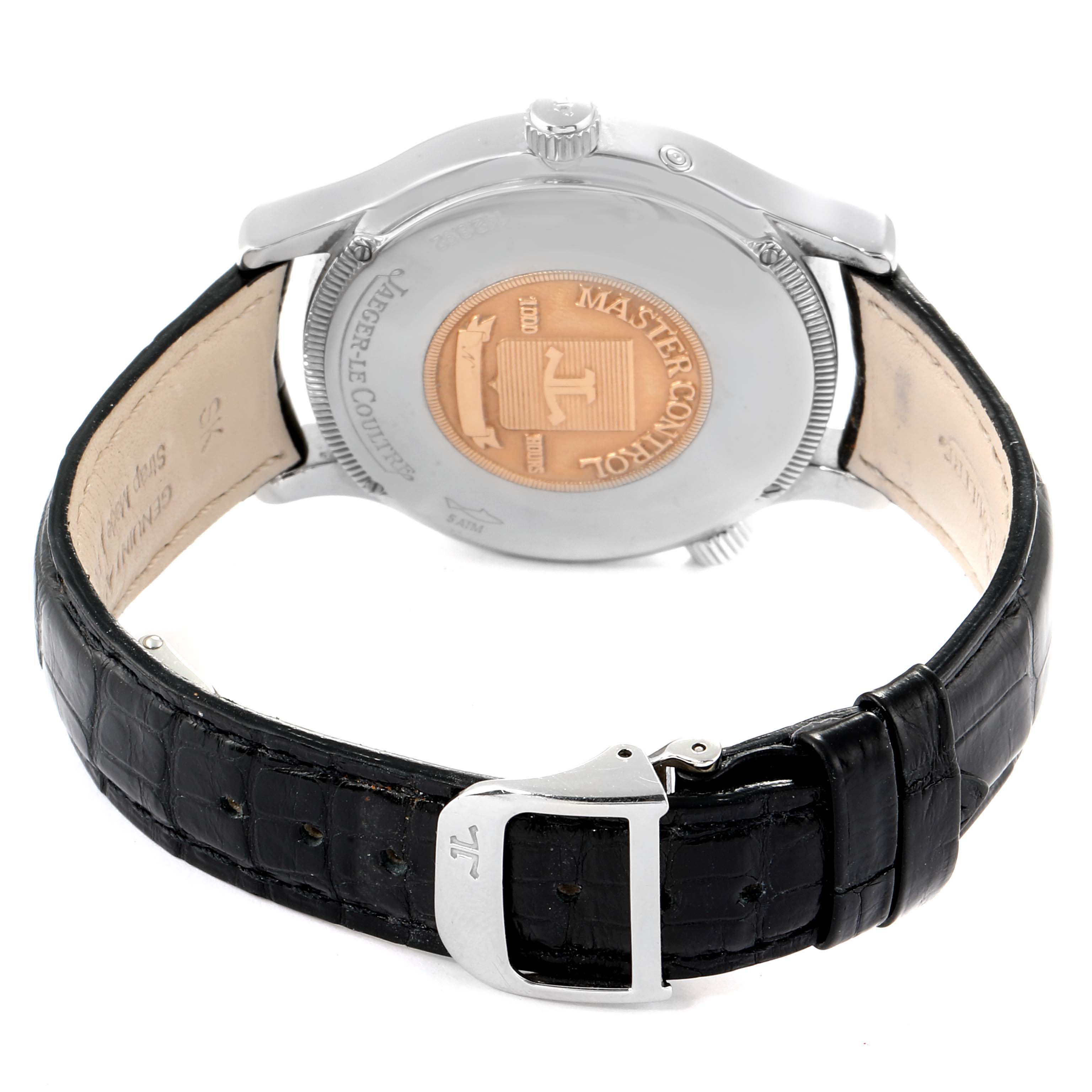 This image shows the back case and strap of the Jaeger-LeCoultre Master model watch, highlighting the brand's emblem and the buckle.