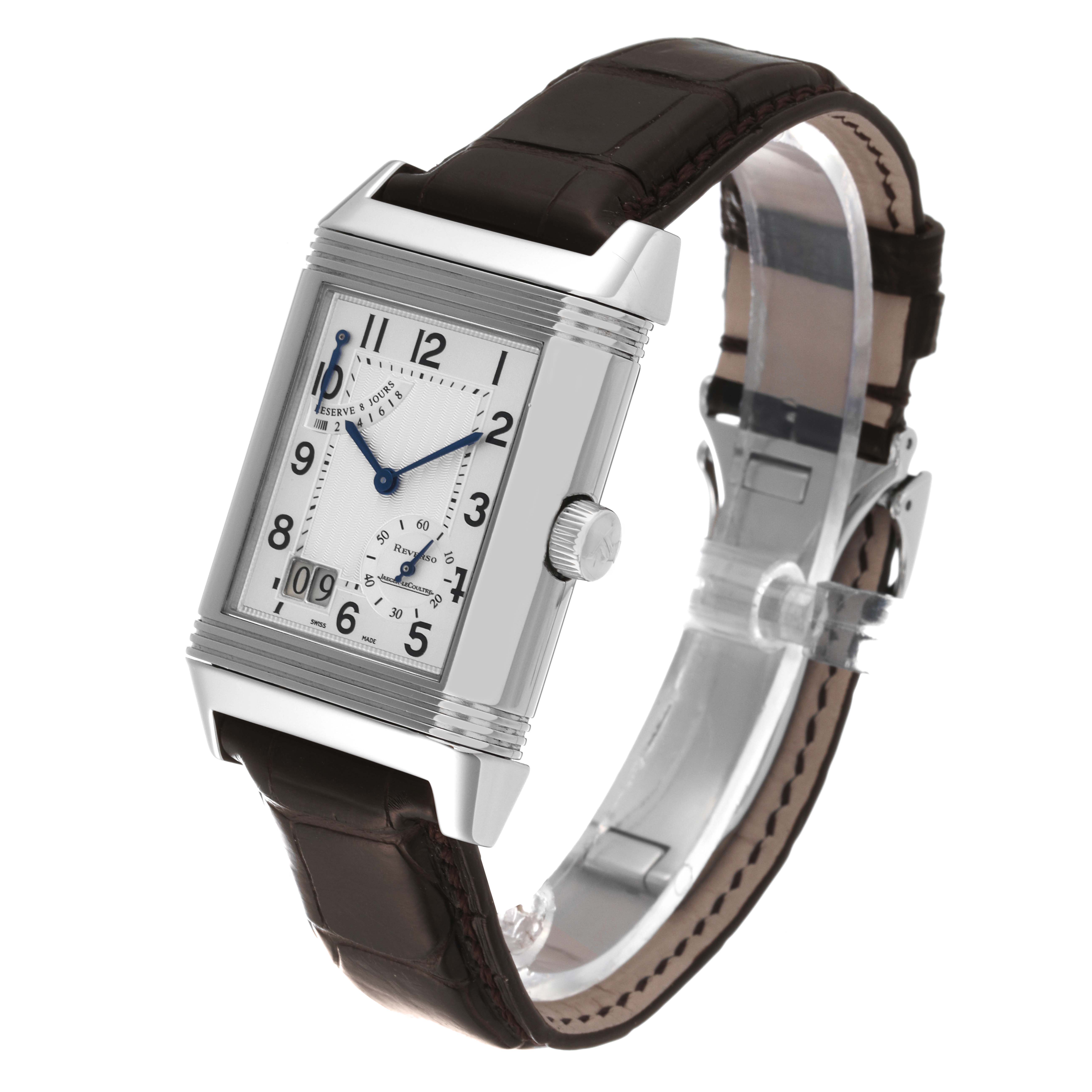 The Jaeger-LeCoultre Reverso watch is shown at a slight angle, displaying its face, strap, and crown.