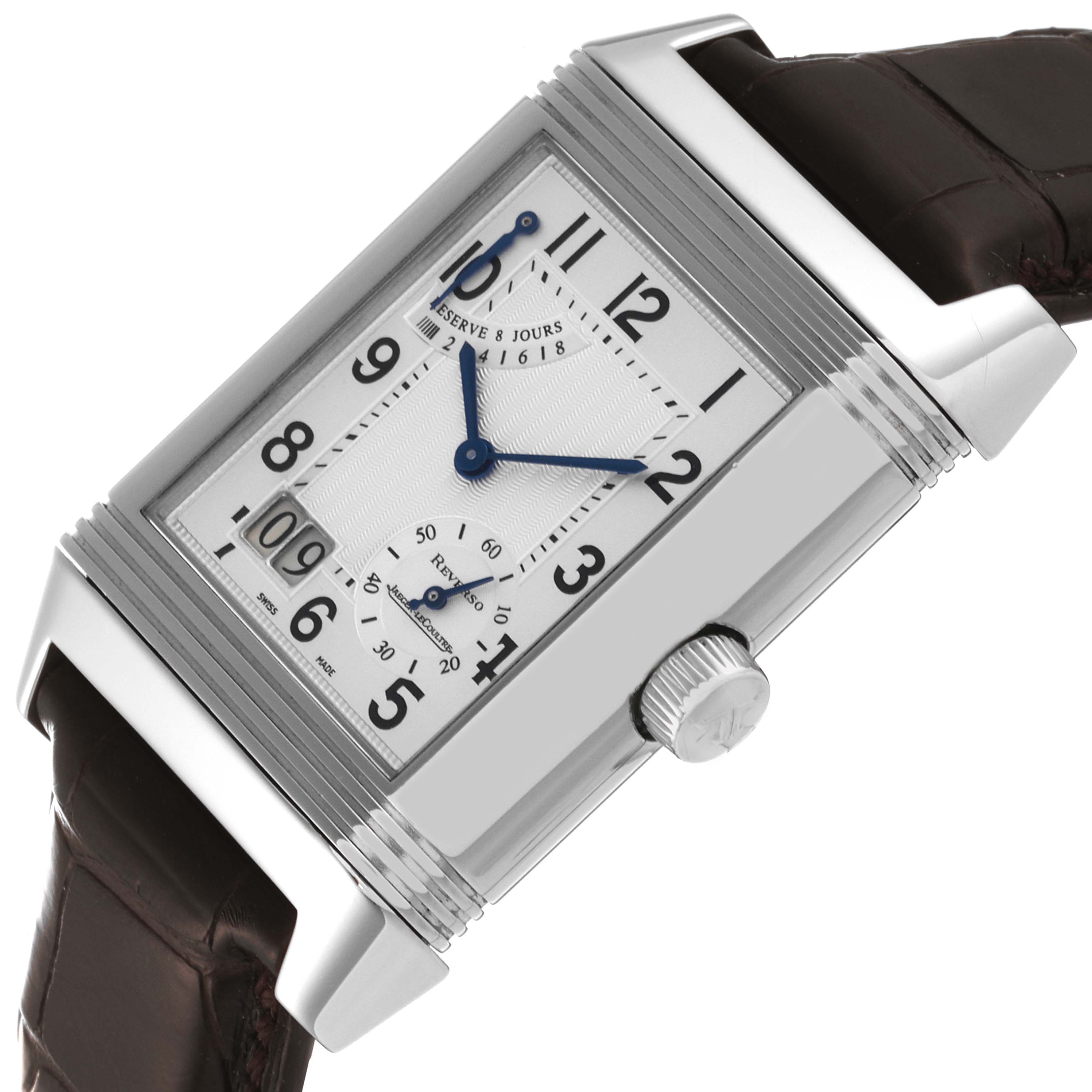 The Jaeger-LeCoultre Reverso watch is shown at an angle from the front, highlighting the dial and strap.