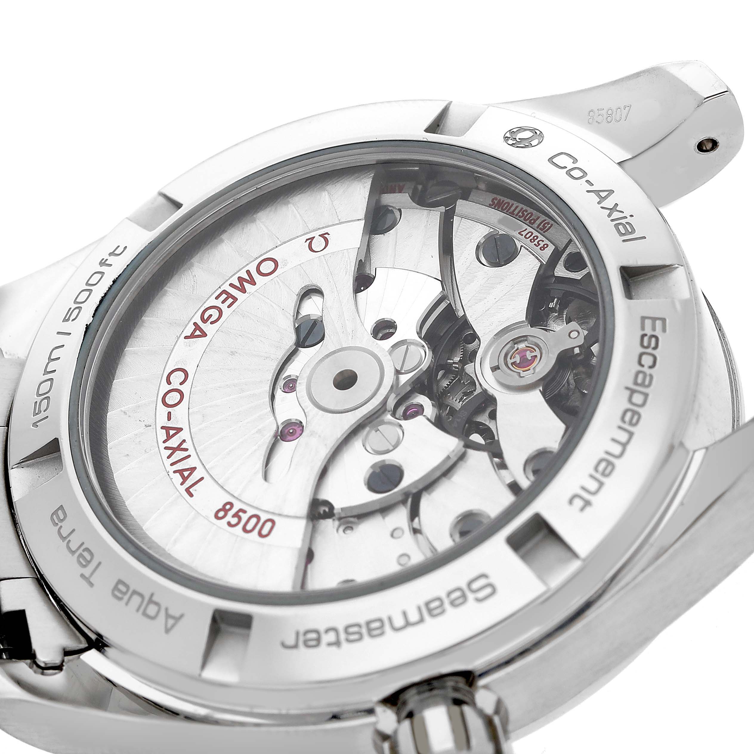 The image shows the back view of the Omega Aqua Terra 231.10.39.21.03.001 Men's Stainless Steel Blue Dial watch, highlighting the Co-Axial escapement and movement details.