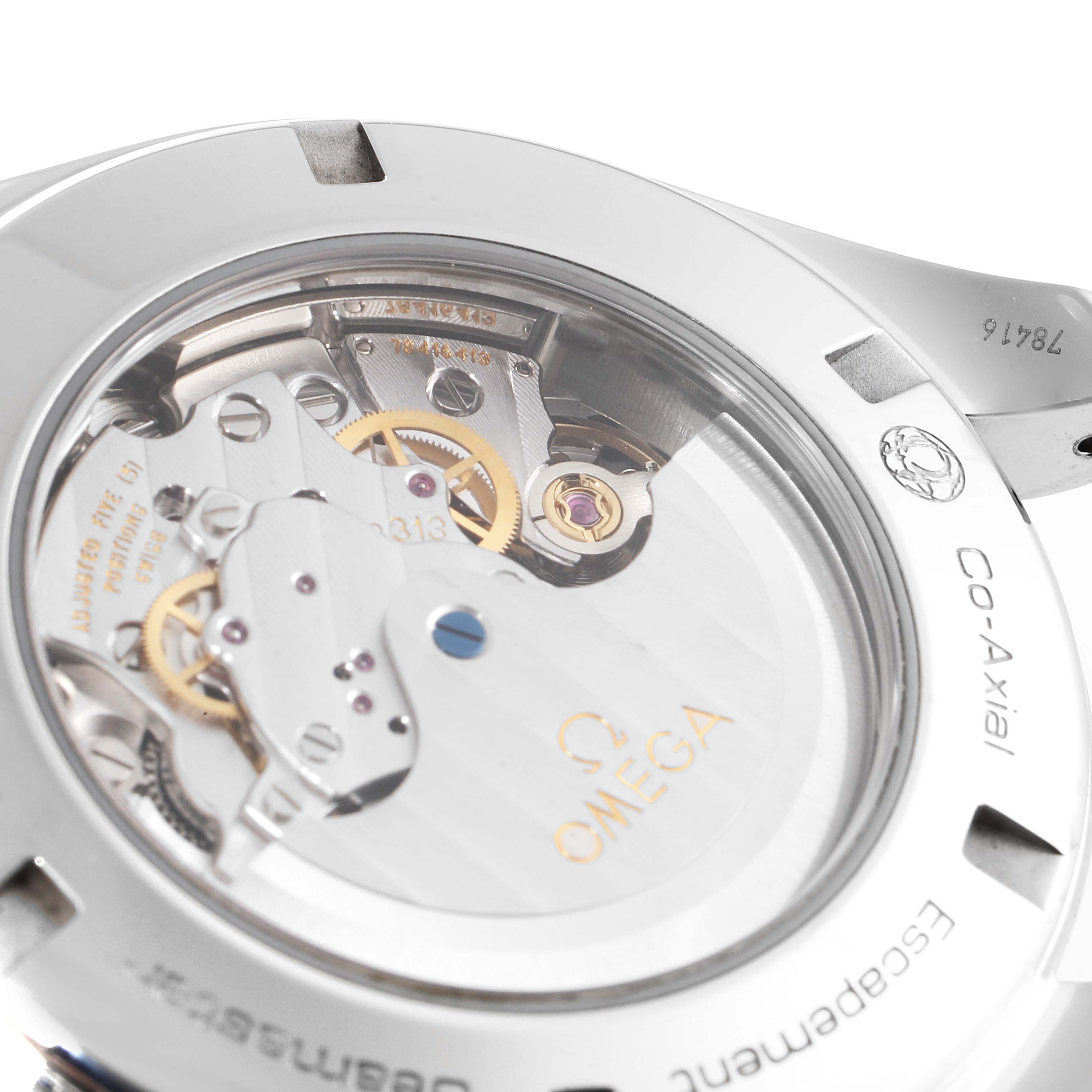 The image shows the back side of an Omega Aqua Terra 231.10.44.50.06.001 Men's Stainless Steel Black Dial 231.10.44.50.06.001 Men's Stainless Steel Black Dial watch, focusing on its visible internal mechanical movement parts.