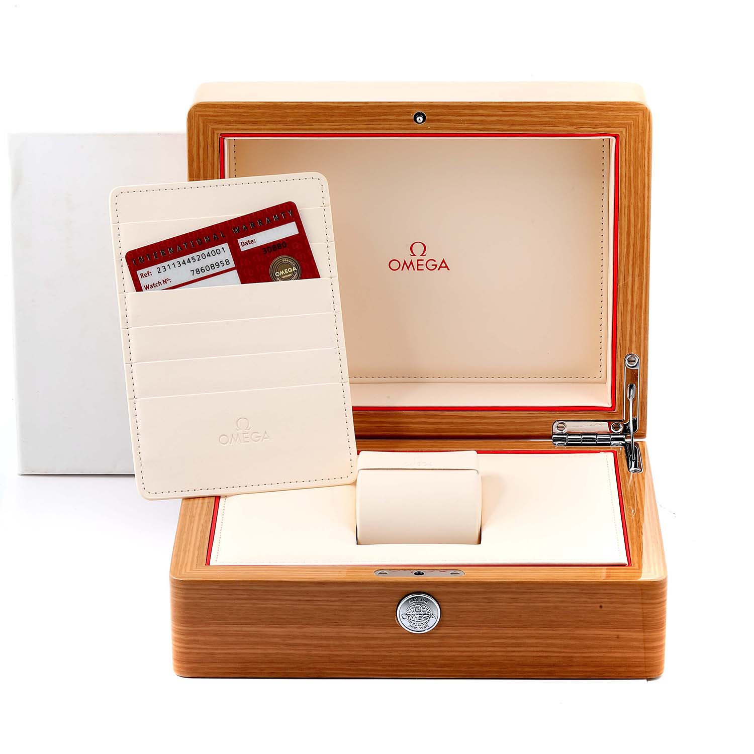 The image shows the interior of an Omega Seamaster 231.10.44.52.04.001 Men
s Stainless Steel White Dial 231.10.44.52.04.001 Men
s Stainless Steel White Dial watch box with a warranty cardholder and watch cushion.