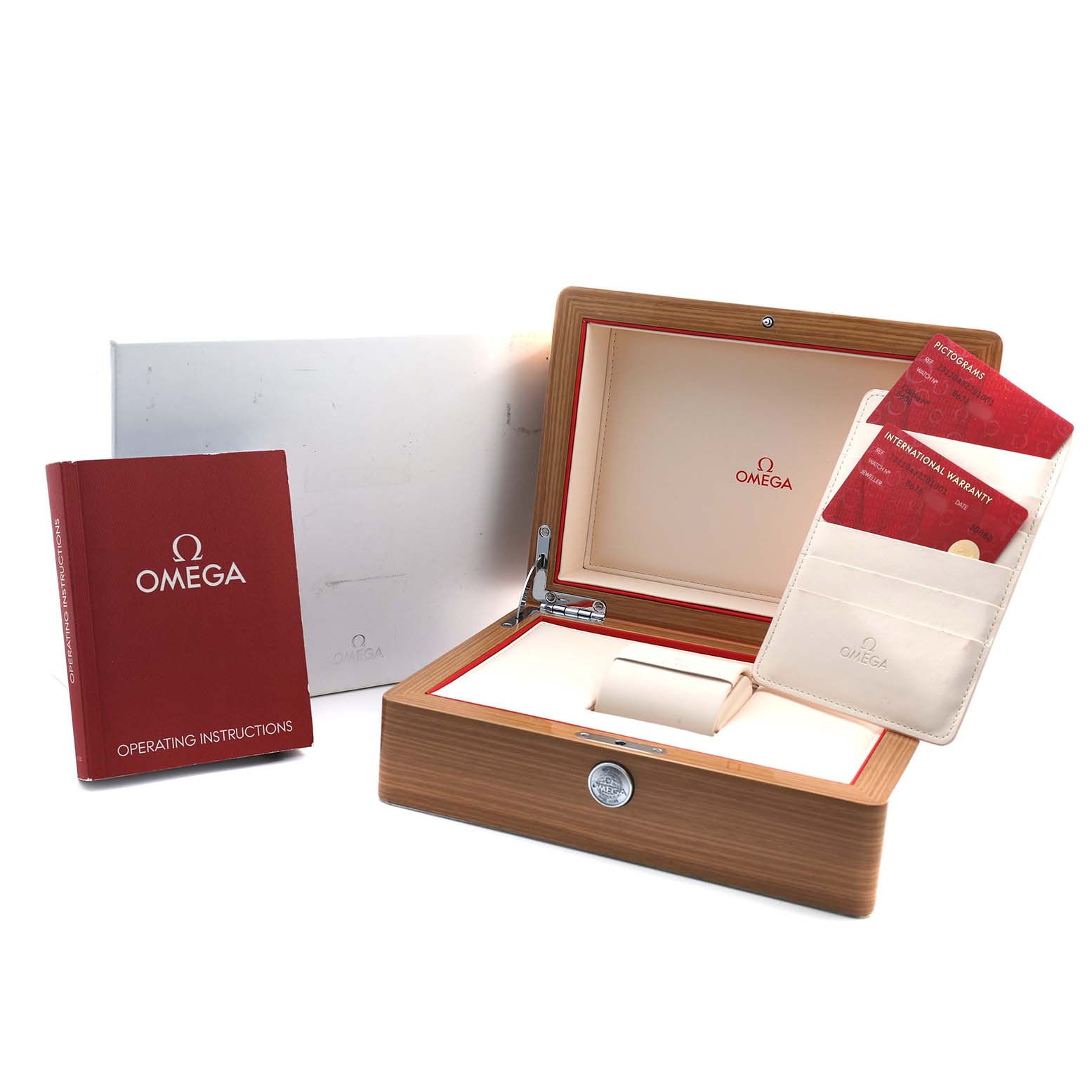 The image shows the Omega Aqua Terra 231.10.43.22.01.001 Men's Stainless Steel Black Dial watch's wooden box, warranty cards, and operating instructions from a top angle.