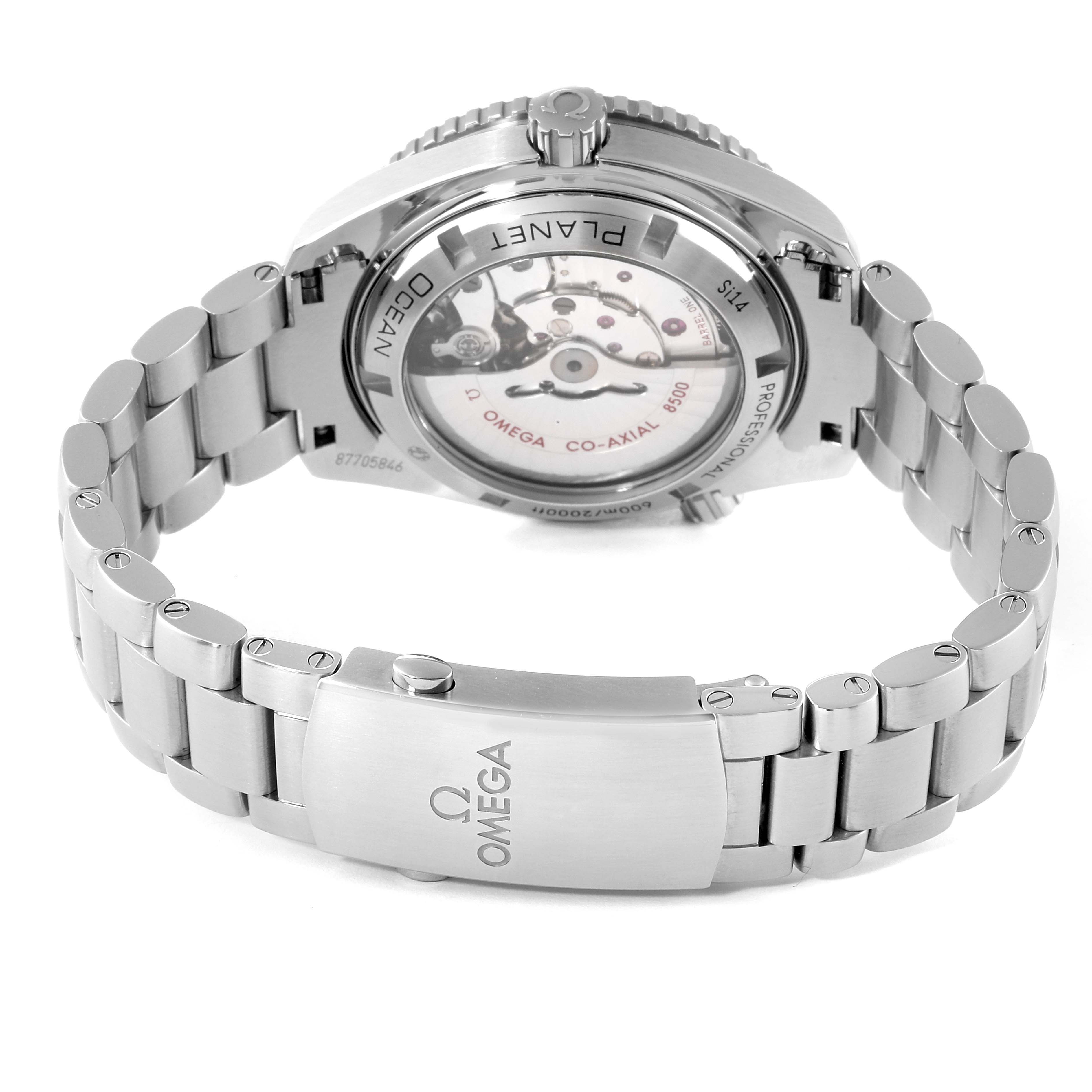 The Omega Planet Ocean 232.30.42.21.01.002 Men
s Stainless Steel Black Dial 232.30.42.21.01.002 Men
s Stainless Steel Black Dial watch is shown from the back, displaying its open caseback and metal bracelet clasp.