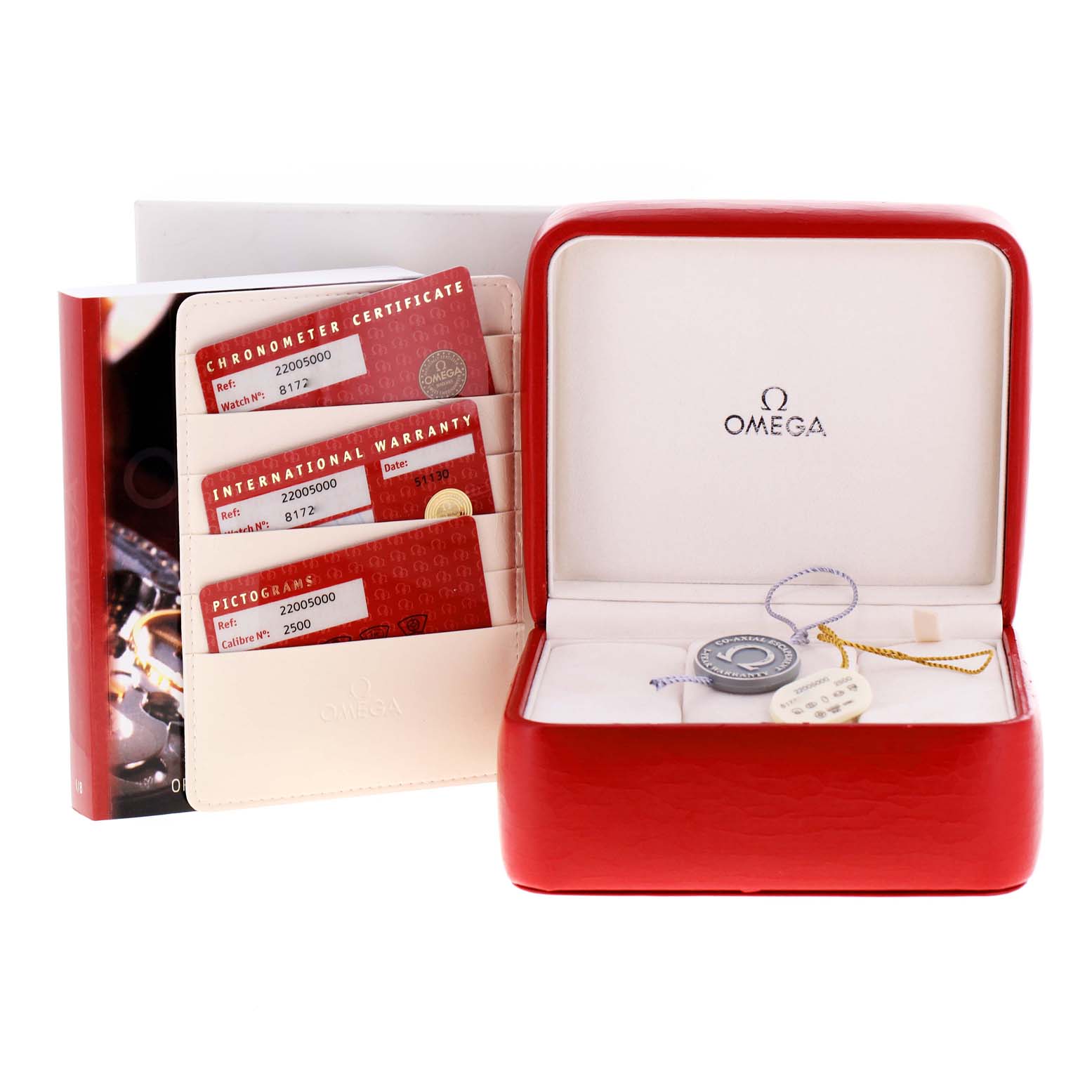 The image shows the accessories for the Omega Planet Ocean 2200.50.00 Men
s Stainless Steel Black Dial 2200.50.00 Men
s Stainless Steel Black Dial watch, including the warranty cards, manuals, and an empty watch box.