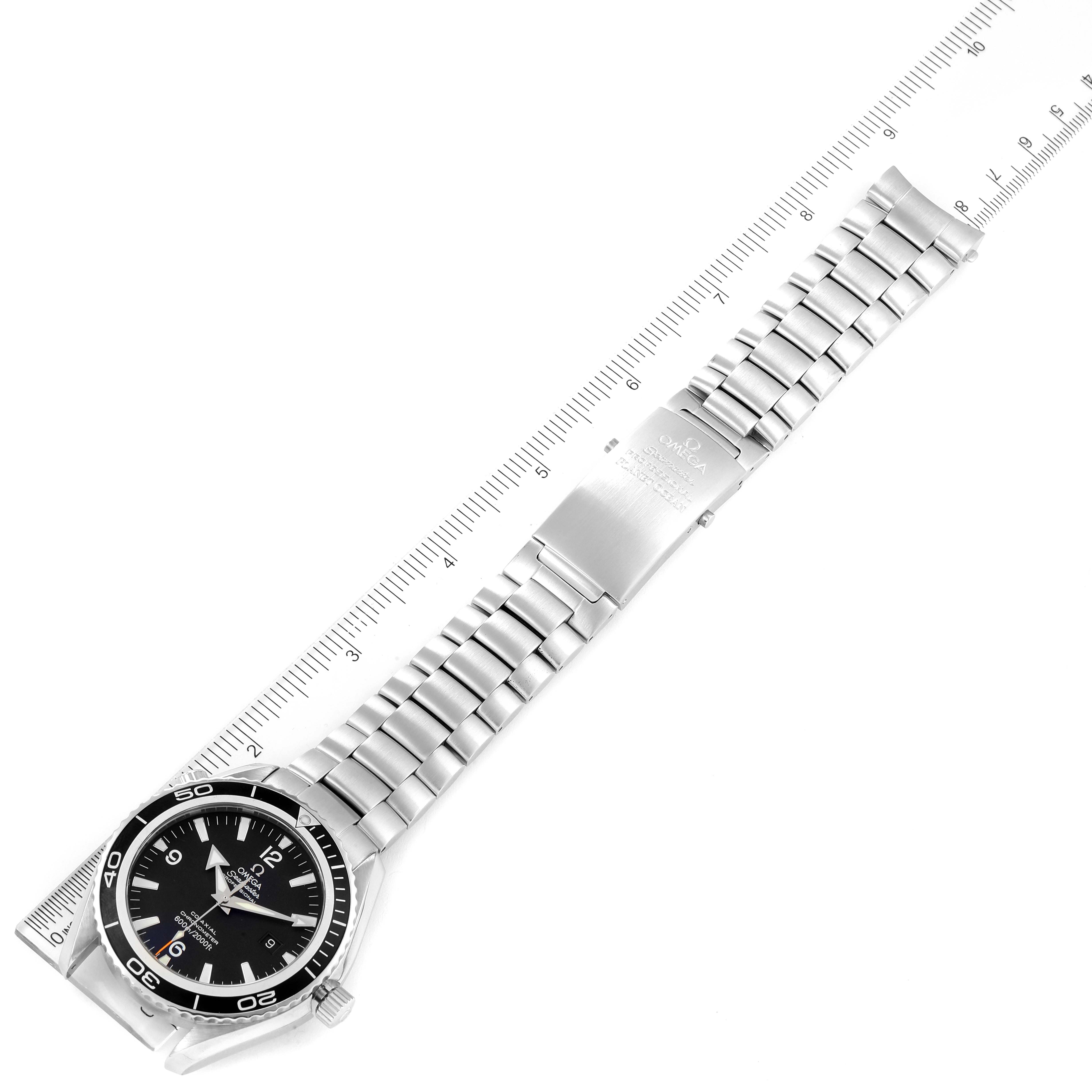 The Omega Planet Ocean 2200.50.00 Men
s Stainless Steel Black Dial 2200.50.00 Men
s Stainless Steel Black Dial watch is shown from a top-down angle, displaying the full length of the watch and its stainless steel bracelet.