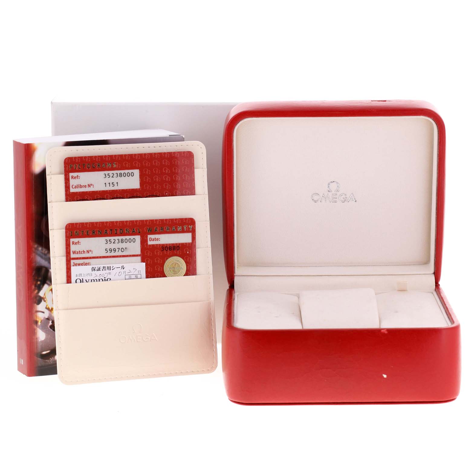 The image shows a red Omega Speedmaster 3523.80.00 Men
s Stainless Steel Blue Dial 3523.80.00 Men
s Stainless Steel Blue Dial watch box, warranty cards, and a booklet.