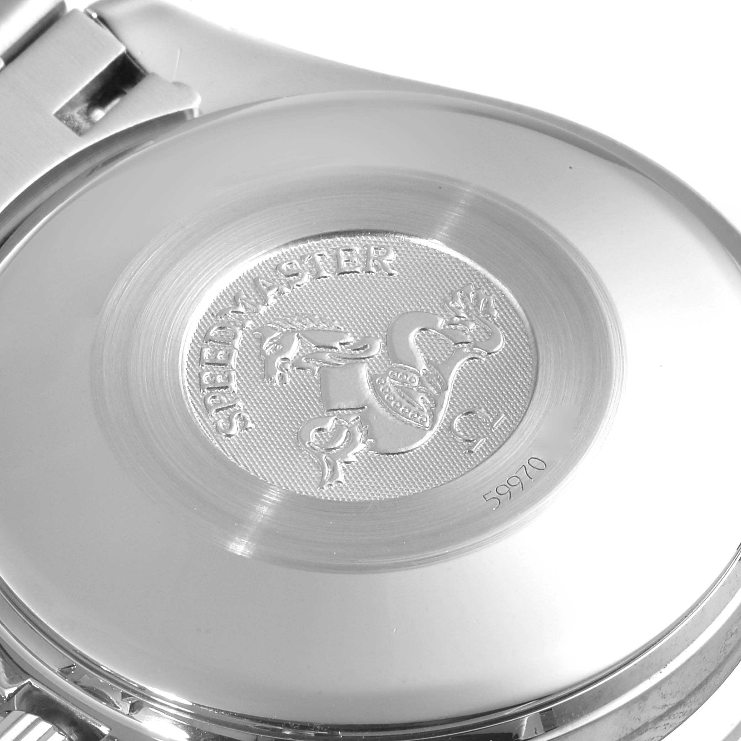 The image shows the back case of an Omega Speedmaster 3523.80.00 Men
s Stainless Steel Blue Dial 3523.80.00 Men
s Stainless Steel Blue Dial watch, displaying the engraved logo and serial number.