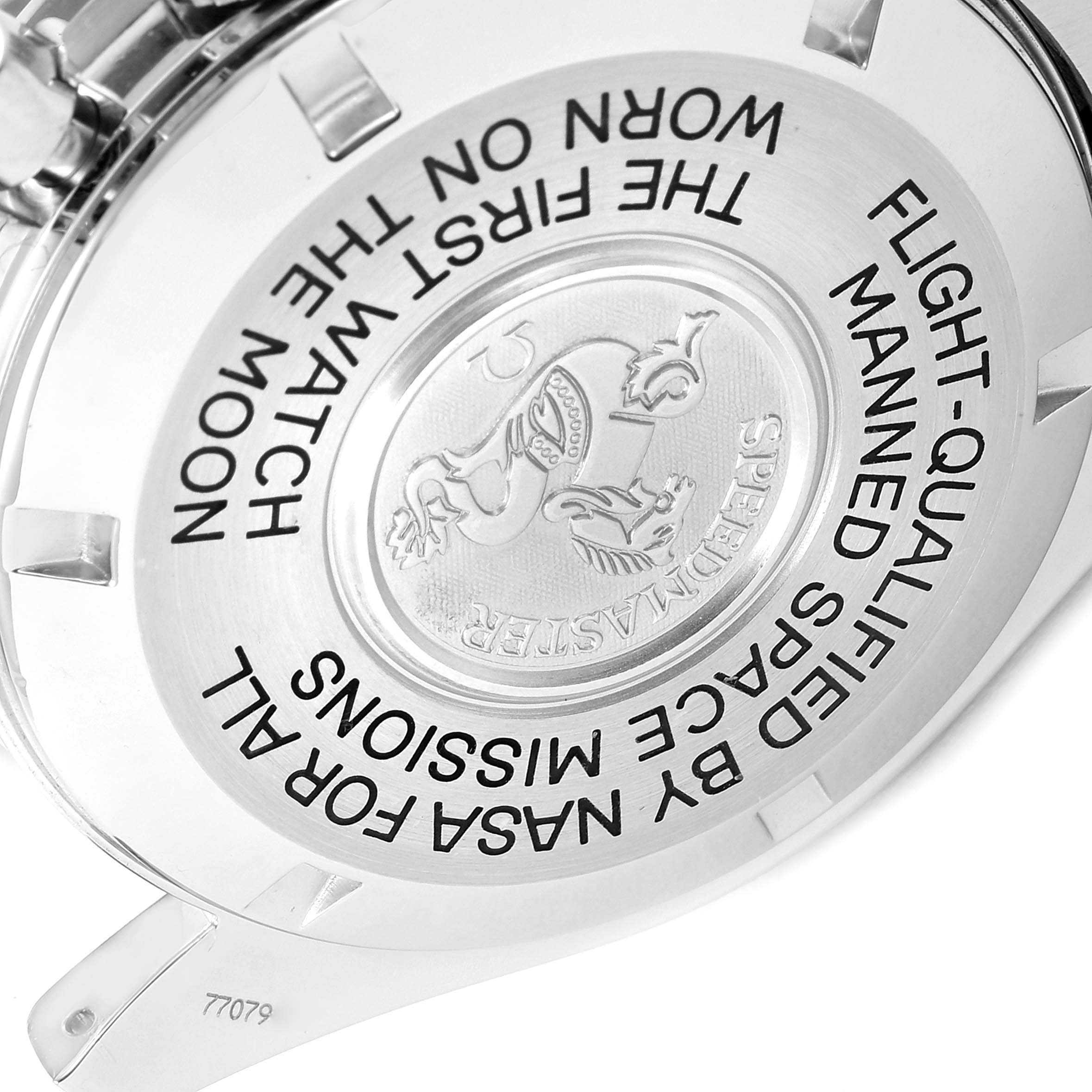 The image shows the back case of an Omega Speedmaster 3575.20.00 Men
s Stainless Steel White Dial 3575.20.00 Men
s Stainless Steel White Dial watch, highlighting its engravings.