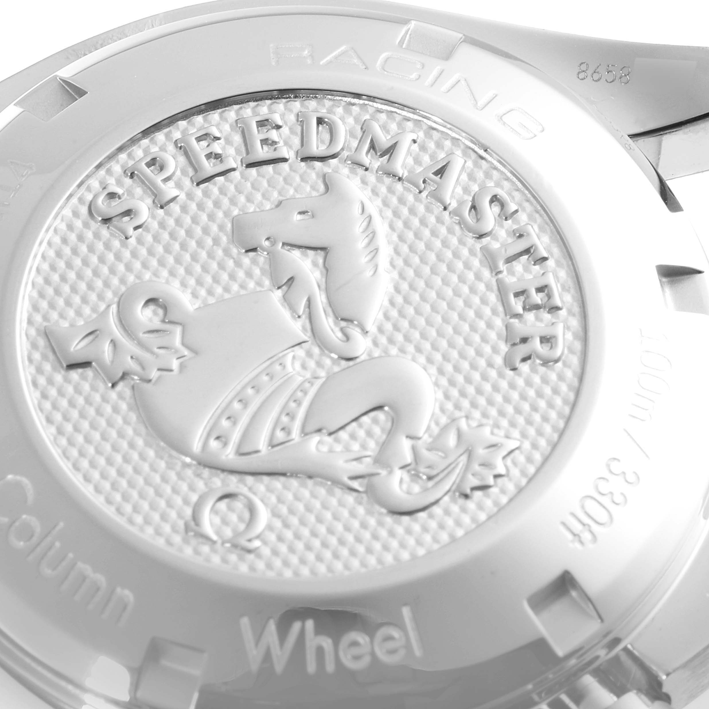 This image shows the back case detailing of an Omega Speedmaster 326.30.40.50.11.001 Men's Stainless Steel Red Dial 326.30.40.50.11.001 Men's Stainless Steel Red Dial watch with the emblem and inscriptions.