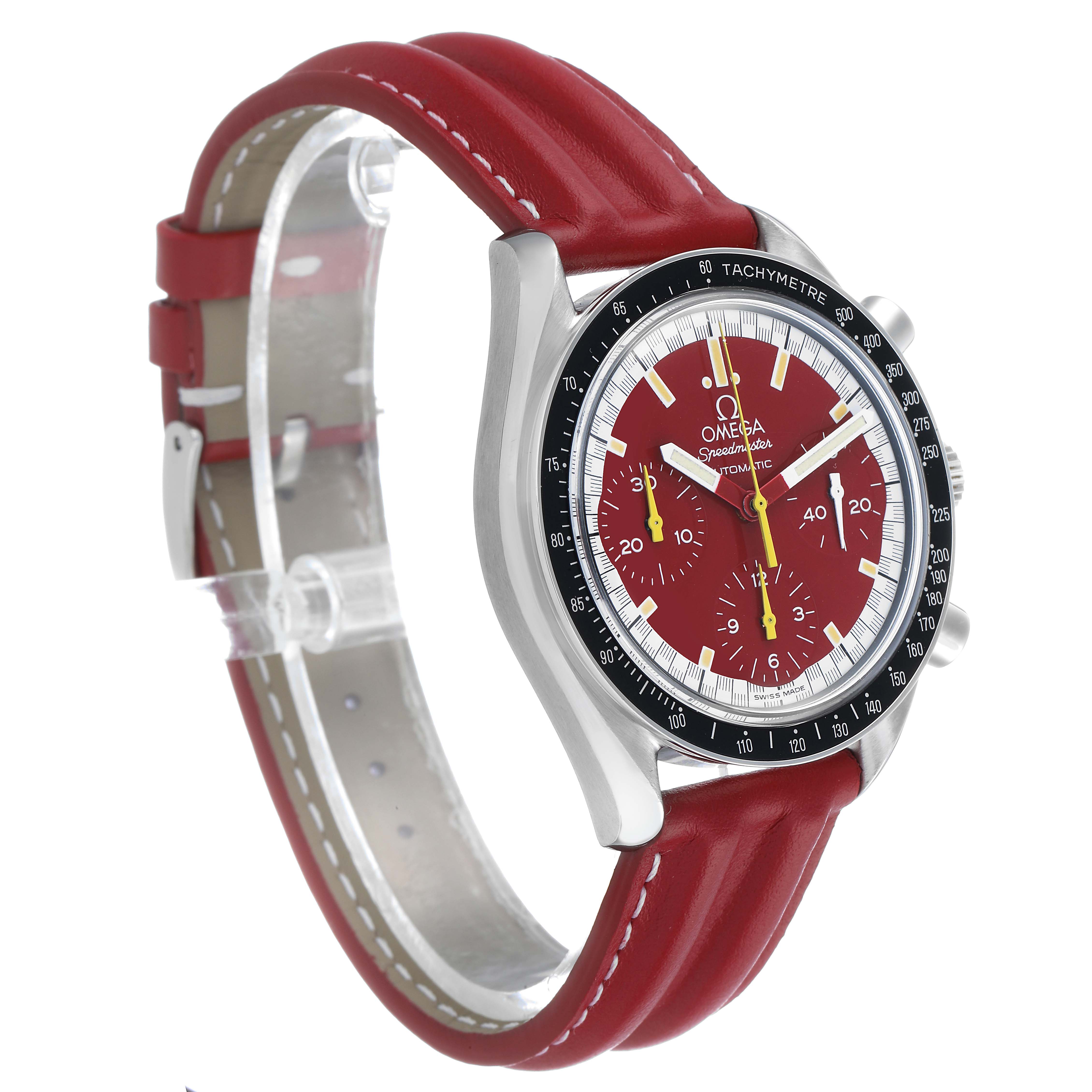 The Omega Speedmaster 3810.61.41 Men's Stainless Steel Red Dial watch is shown from a front-left angle, displaying its red dial, tachymeter bezel, and red leather strap.