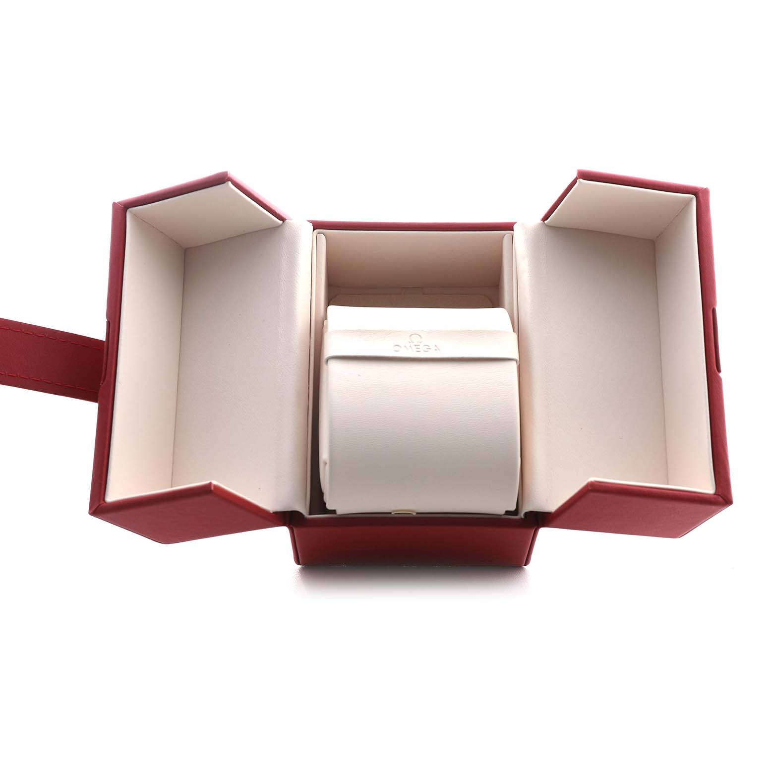 The image shows an open, empty Omega Speedmaster 3810.61.41 Men's Stainless Steel Red Dial watch box from a top view, featuring a red outer layer and a cream-colored interior.