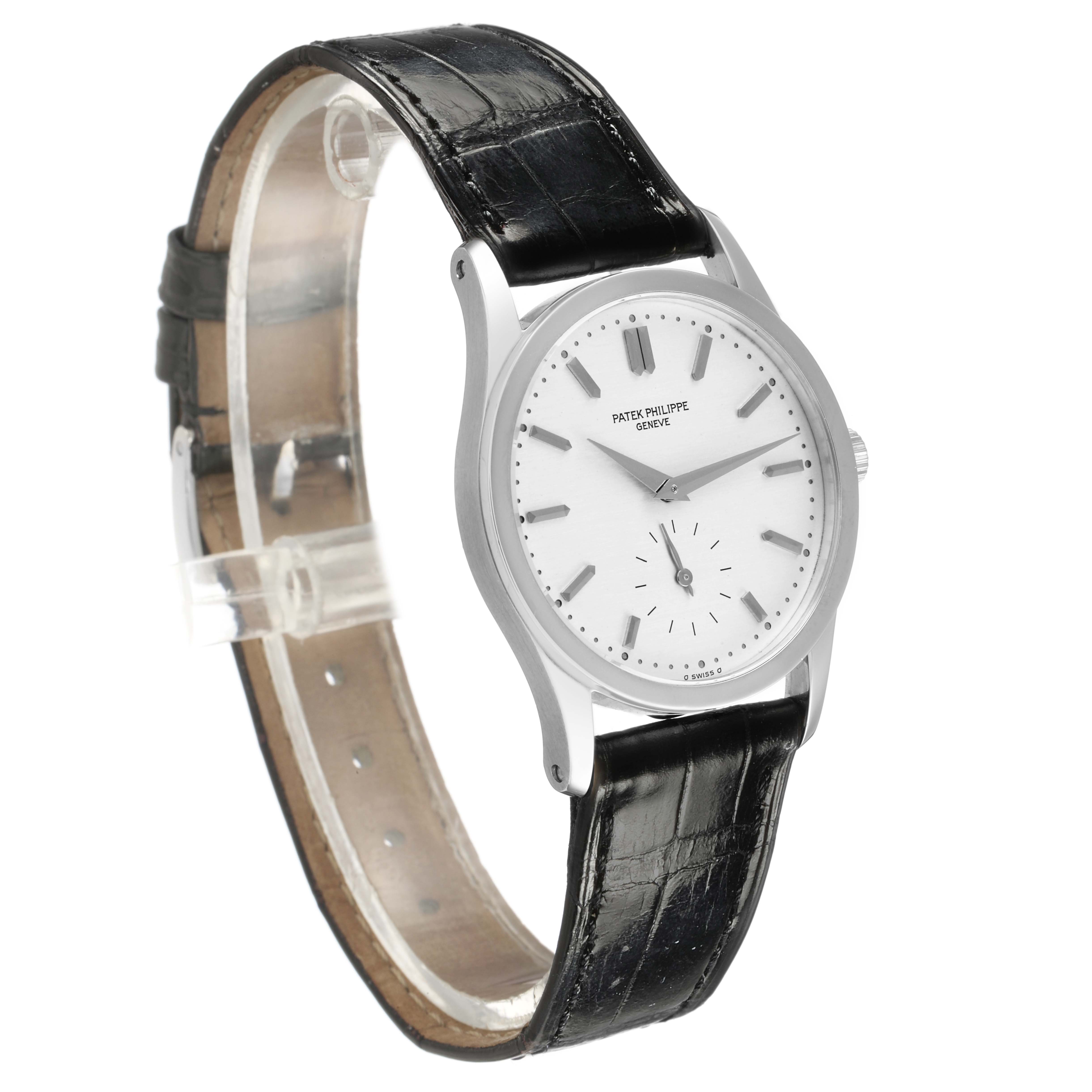 The Patek Philippe Calatrava 3796P-010 Men's Platinum Silver Dial watch is shown at a three-quarter angle, displaying the face, hands, case, and black leather strap.