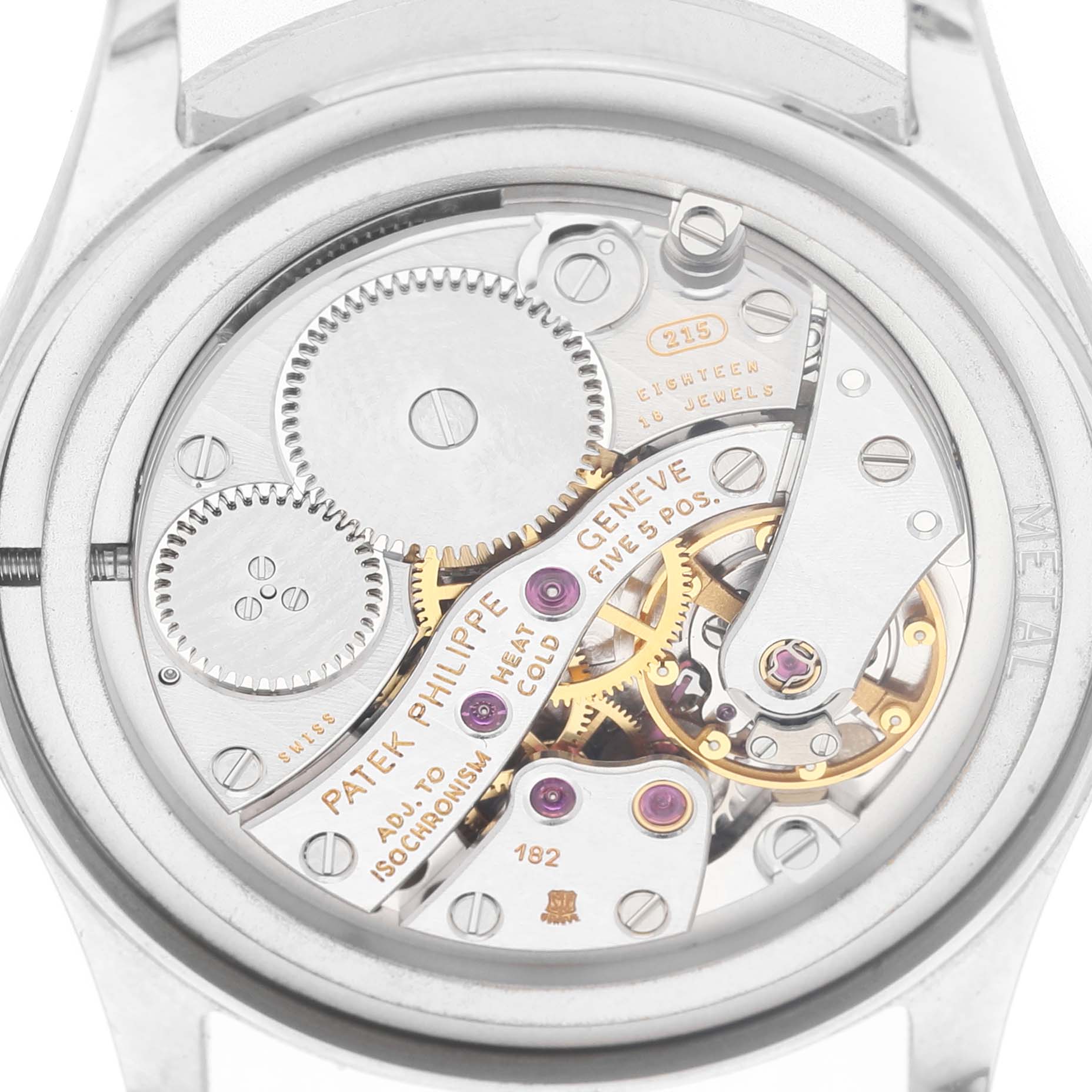 The image shows the movement and inner workings of a Patek Philippe Calatrava 3796P-010 Men's Platinum Silver Dial watch from the back.