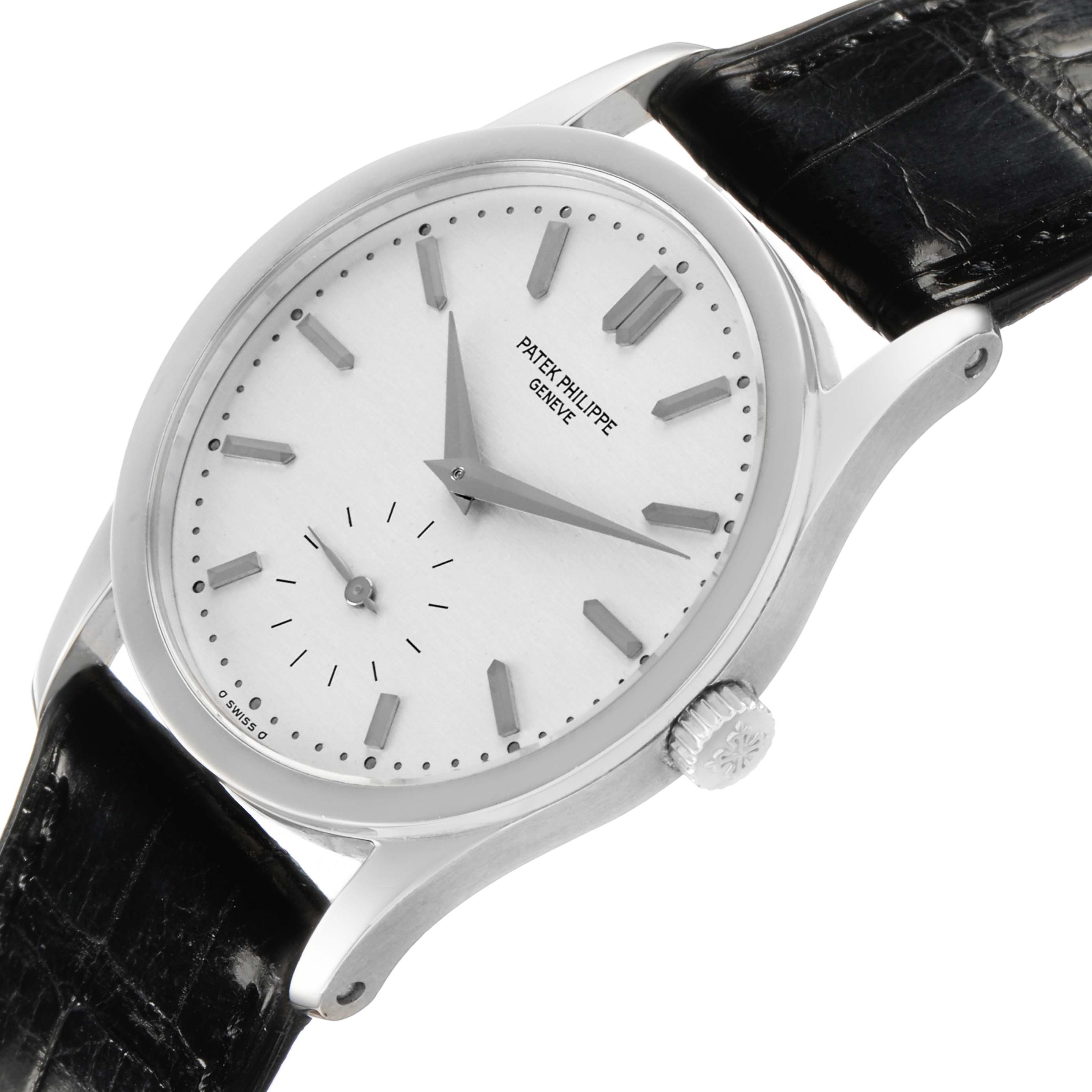 The Patek Philippe Calatrava 3796P-010 Men's Platinum Silver Dial watch is shown at a slight angle, highlighting the face, crown, and strap connection.