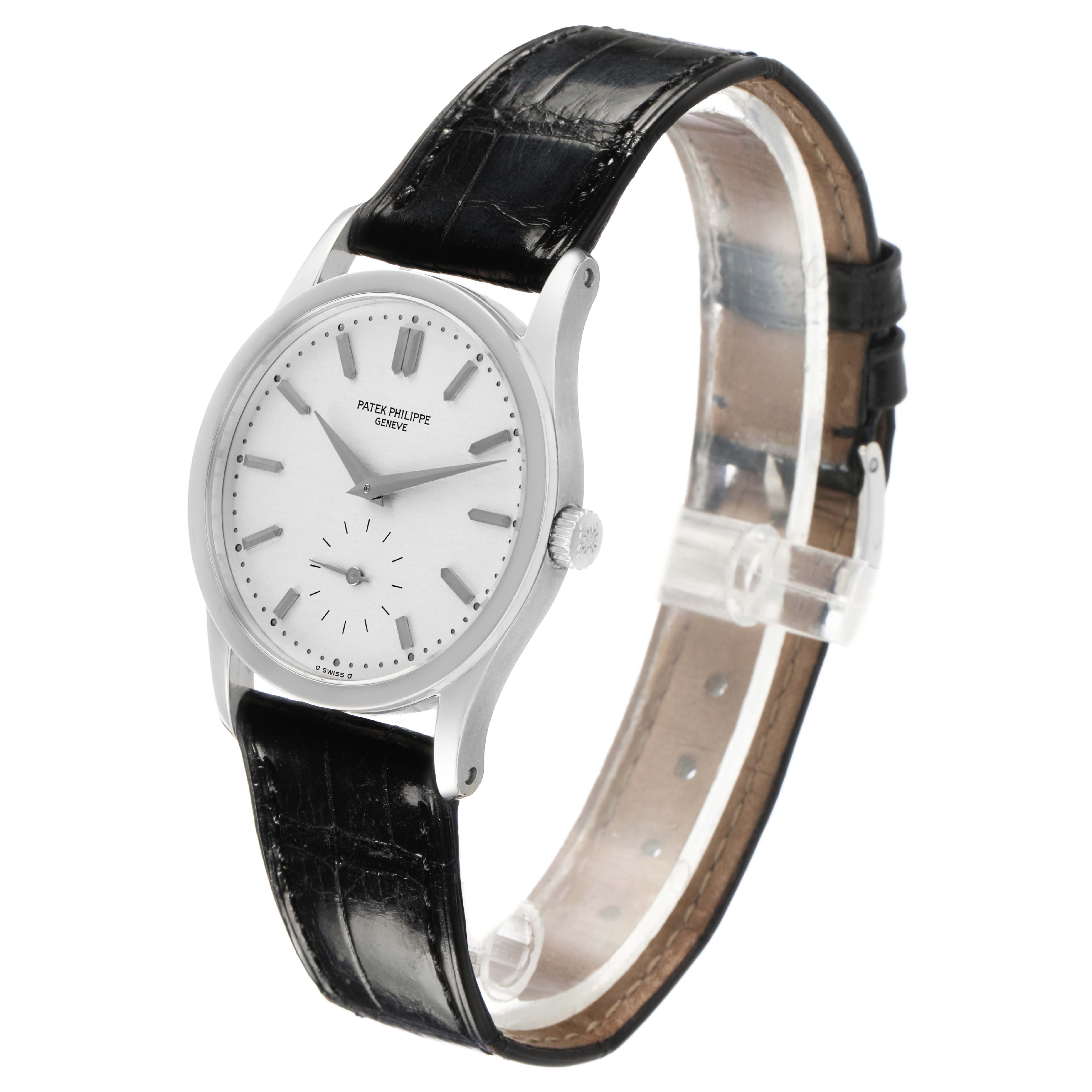 The image shows a Patek Philippe Calatrava 3796P-010 Men's Platinum Silver Dial watch at a slight side angle, highlighting the dial, case, crown, and leather strap.