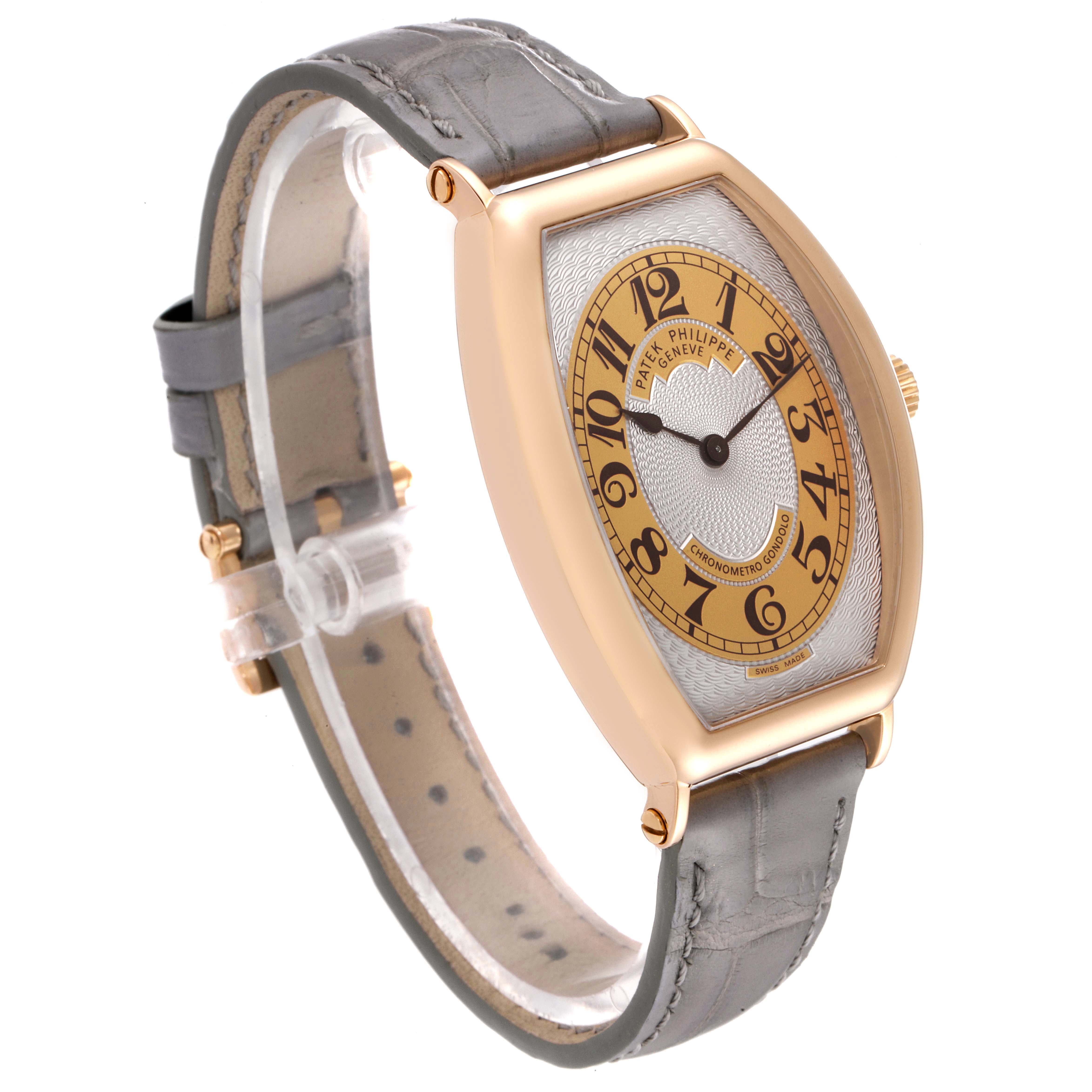 The image shows a side angle of a Patek Philippe Gondolo 5098R Men's Rose Gold Silver Dial 5098R Men's Rose Gold Silver Dial watch, highlighting the face, strap, and crown.