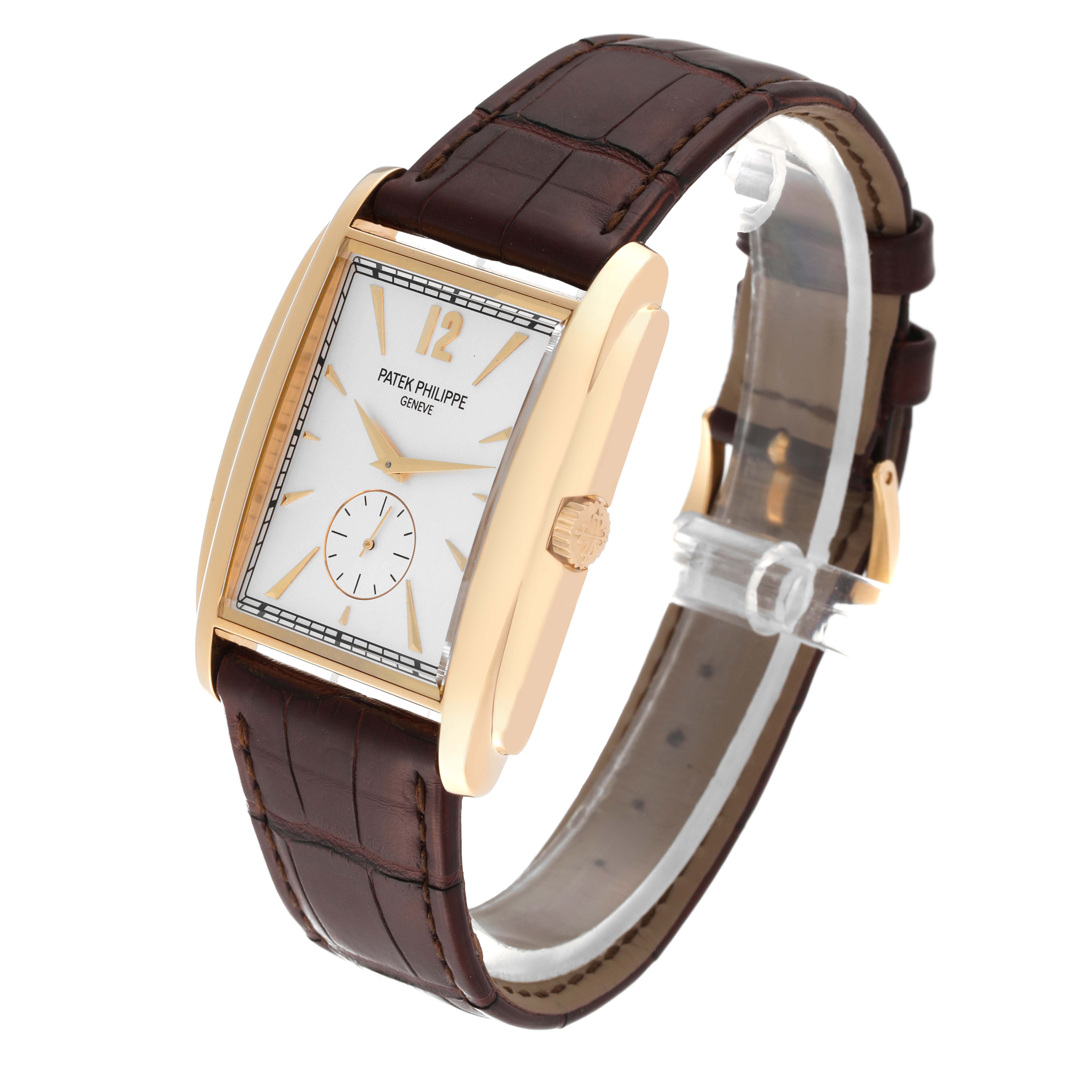 The image shows a side angle of a Patek Philippe Gondolo 5124J Men's Yellow Gold Silver Dial 5124J Men's Yellow Gold Silver Dial watch, focusing on the rectangular dial and brown leather strap.