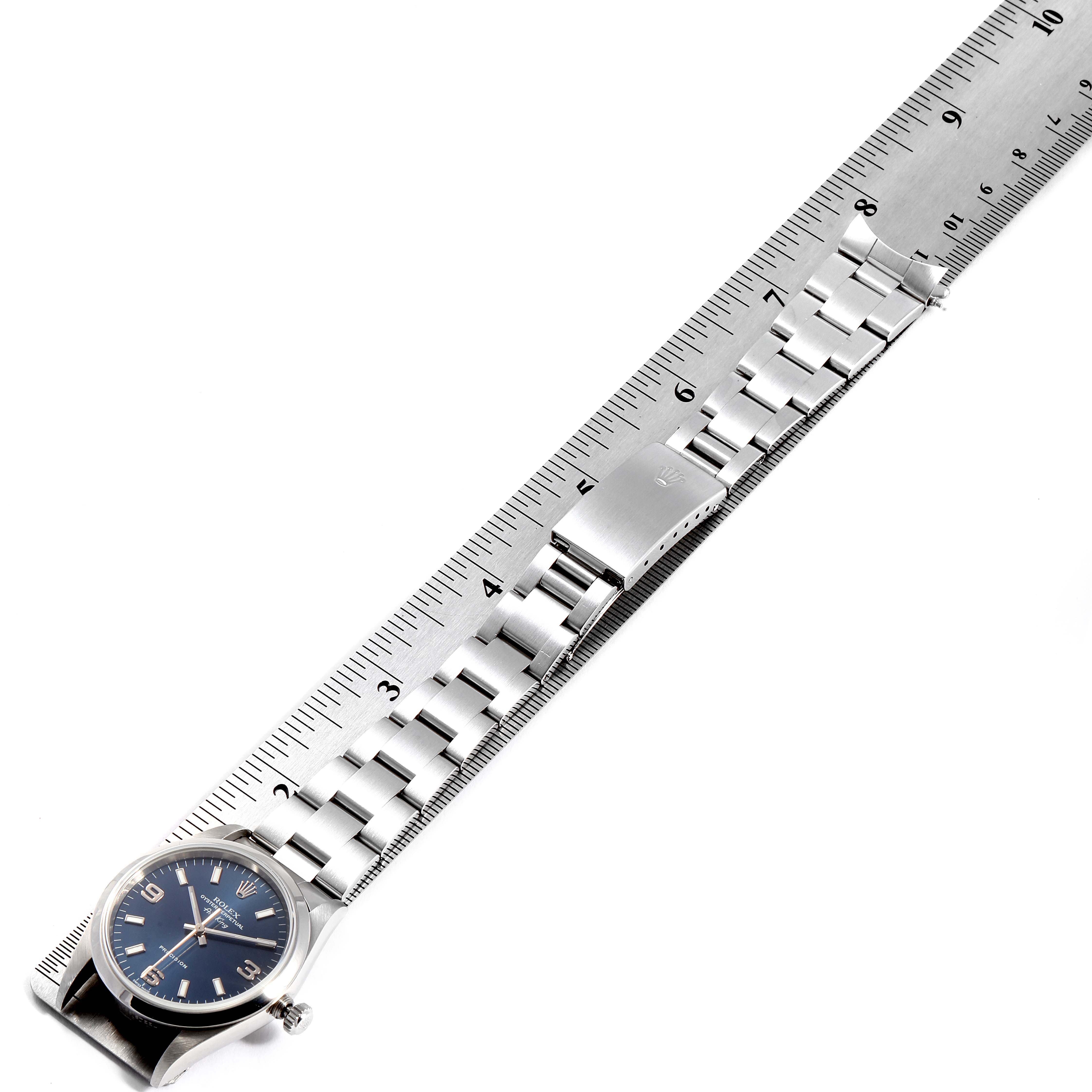 The image shows a Rolex Air-King 14000M Men's Stainless Steel Blue Dial 14000M Men's Stainless Steel Blue Dial watch with a stainless steel bracelet, laid out flat next to a ruler for measurement.