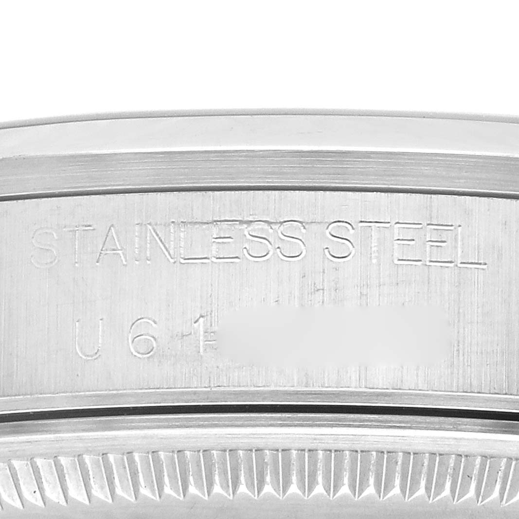This image shows a close-up of the case back of the Rolex Air-King 14000 Men's Stainless Steel Silver Dial 14000 Men's Stainless Steel Silver Dial watch, highlighting its stainless steel composition.