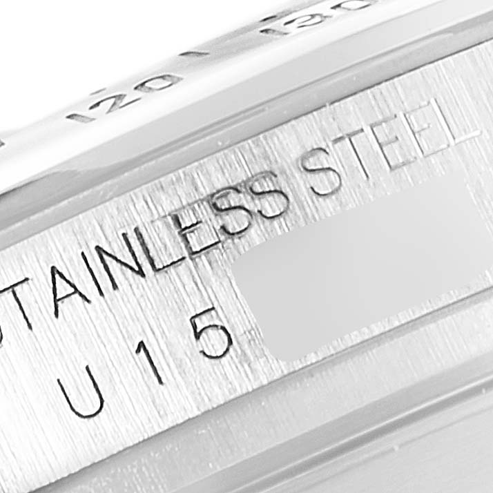 The image shows a close-up angle of the stainless steel engraving and partial serial number on the case of a Rolex Daytona 16520 Men's Stainless Steel White Dial 16520 Men's Stainless Steel White Dial watch.