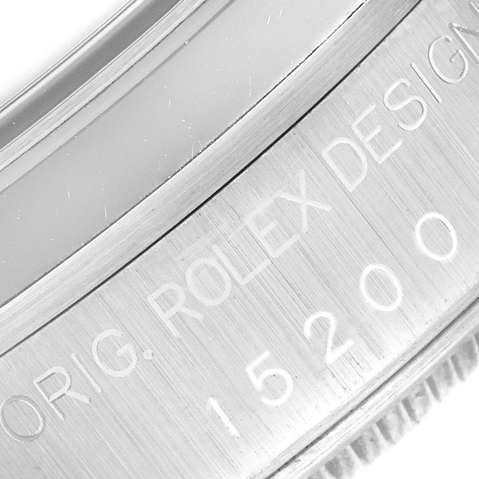 This image shows a close-up of the case back and edge side of a Rolex Date 15200 Men's Stainless Steel Black Dial 15200 Men's Stainless Steel Black Dial model watch, highlighting the engravings.