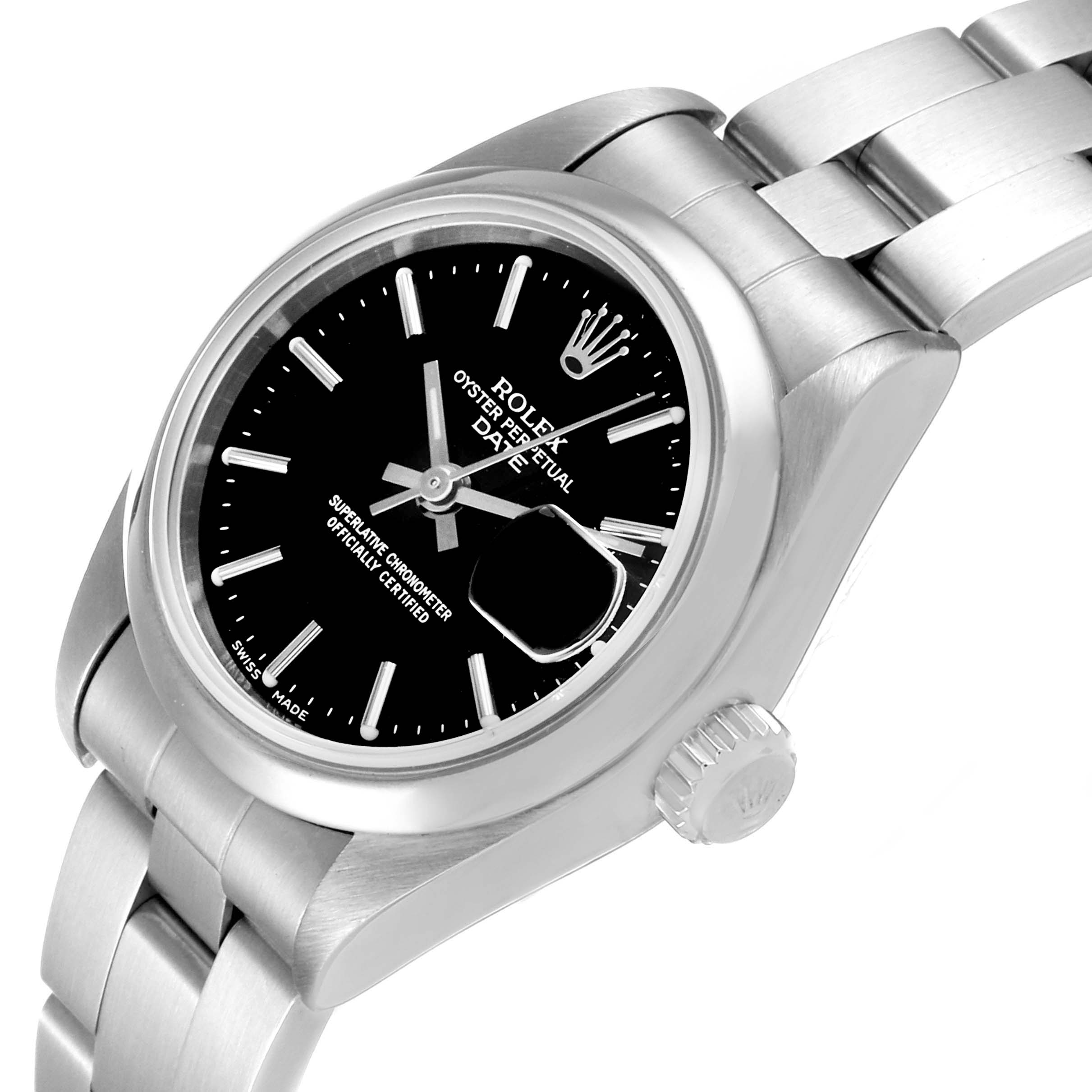 The Rolex Date 69160 Women's Stainless Steel Black Dial 69160 Women's Stainless Steel Black Dial watch is shown from a three-quarter angle, highlighting the face, bezel, crown, and part of the bracelet.