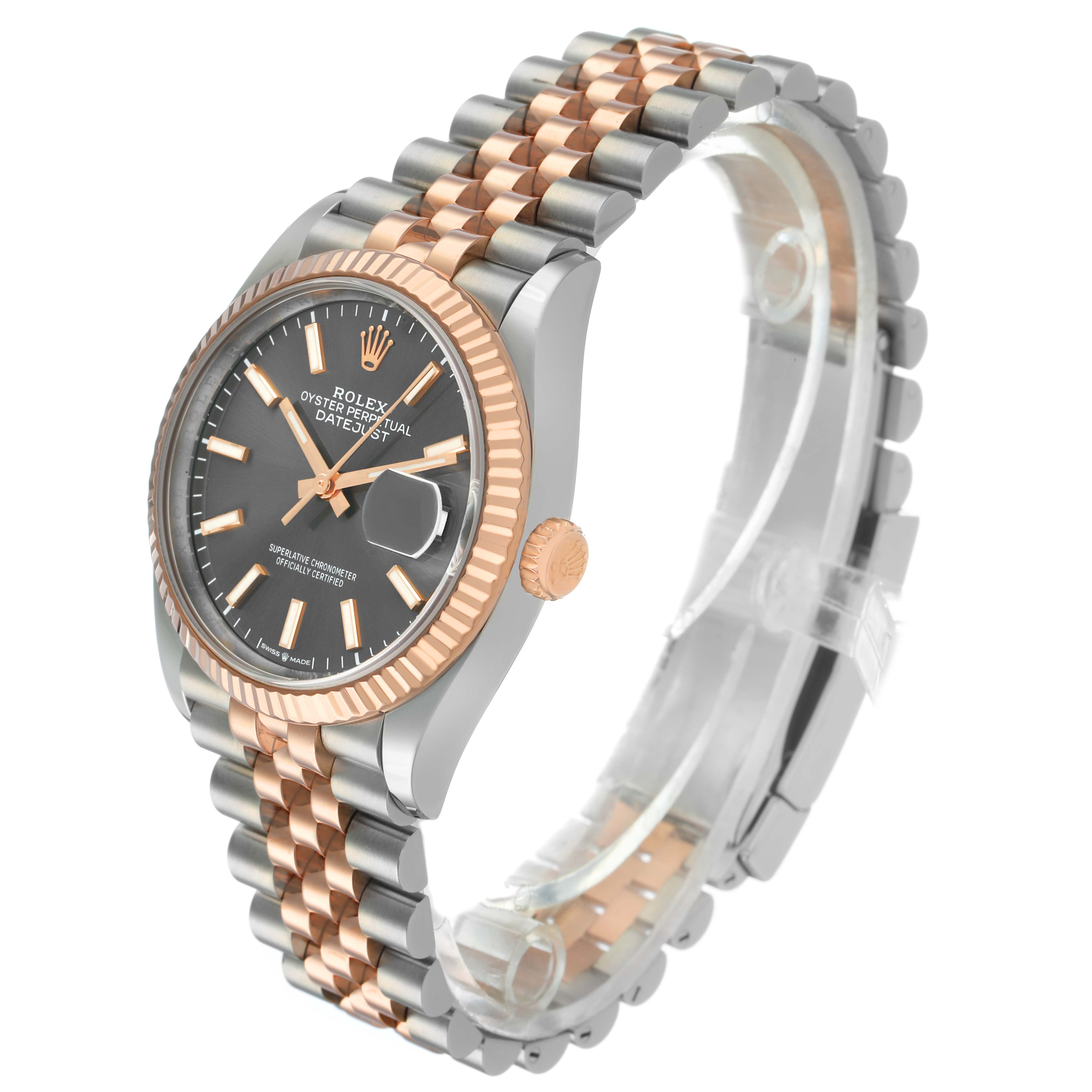 The Rolex Datejust 126231 Men's Steel and Gold (two tone) Grey Dial watch is shown at an angled side view, displaying the face, fluted bezel, crown, and two-tone bracelet.