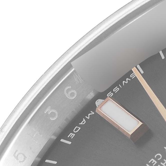 This image shows a close-up of the dial and hour markers of a Rolex Datejust 126201 Men's Steel and Gold (two tone) Grey Dial 126201 Men's Steel and Gold (two tone) Grey Dial watch.