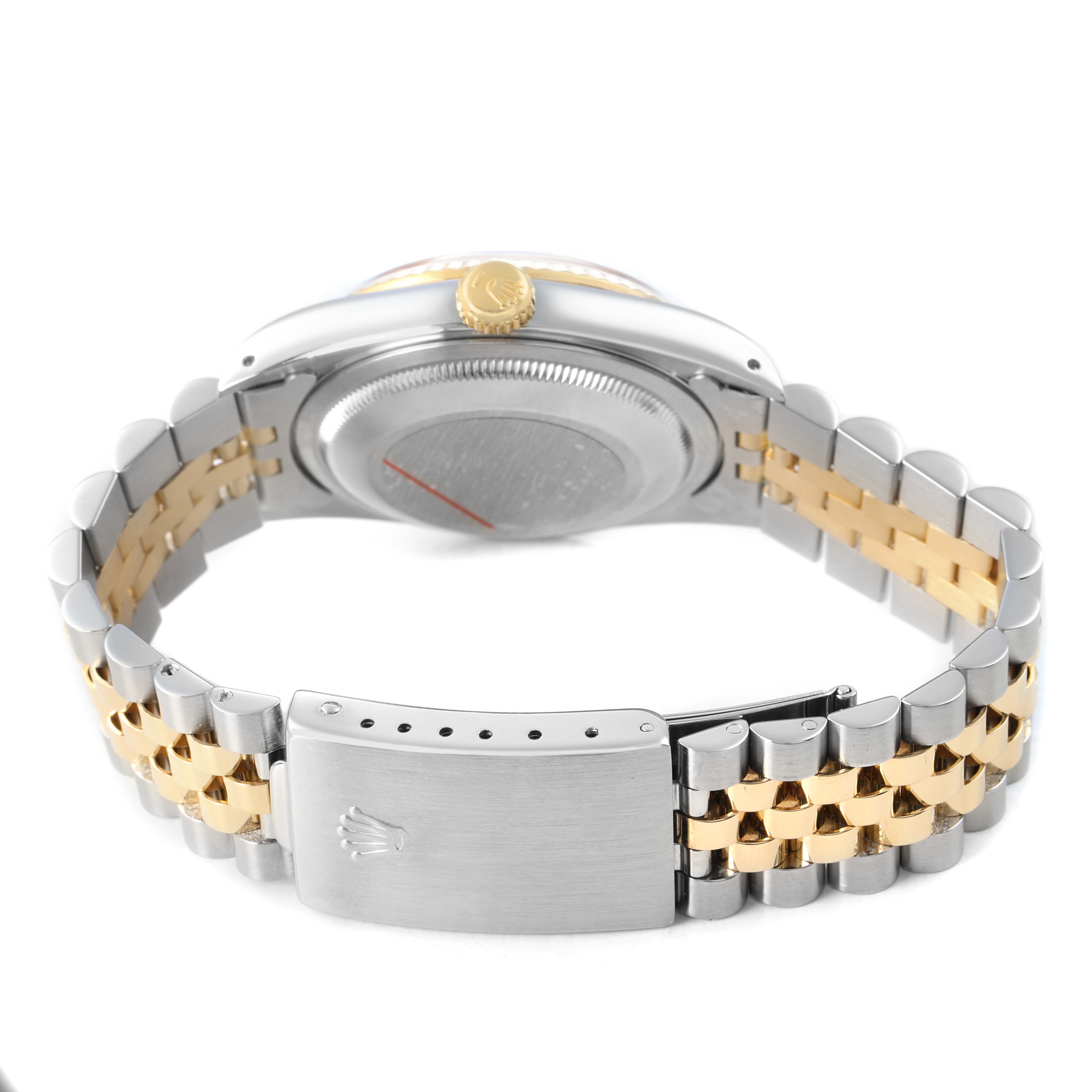 The image shows the Rolex Datejust 16233 Men's Steel and Gold (two tone) Champagne Dial from a back angle, highlighting the case back, crown, and bicolor bracelet with clasp.