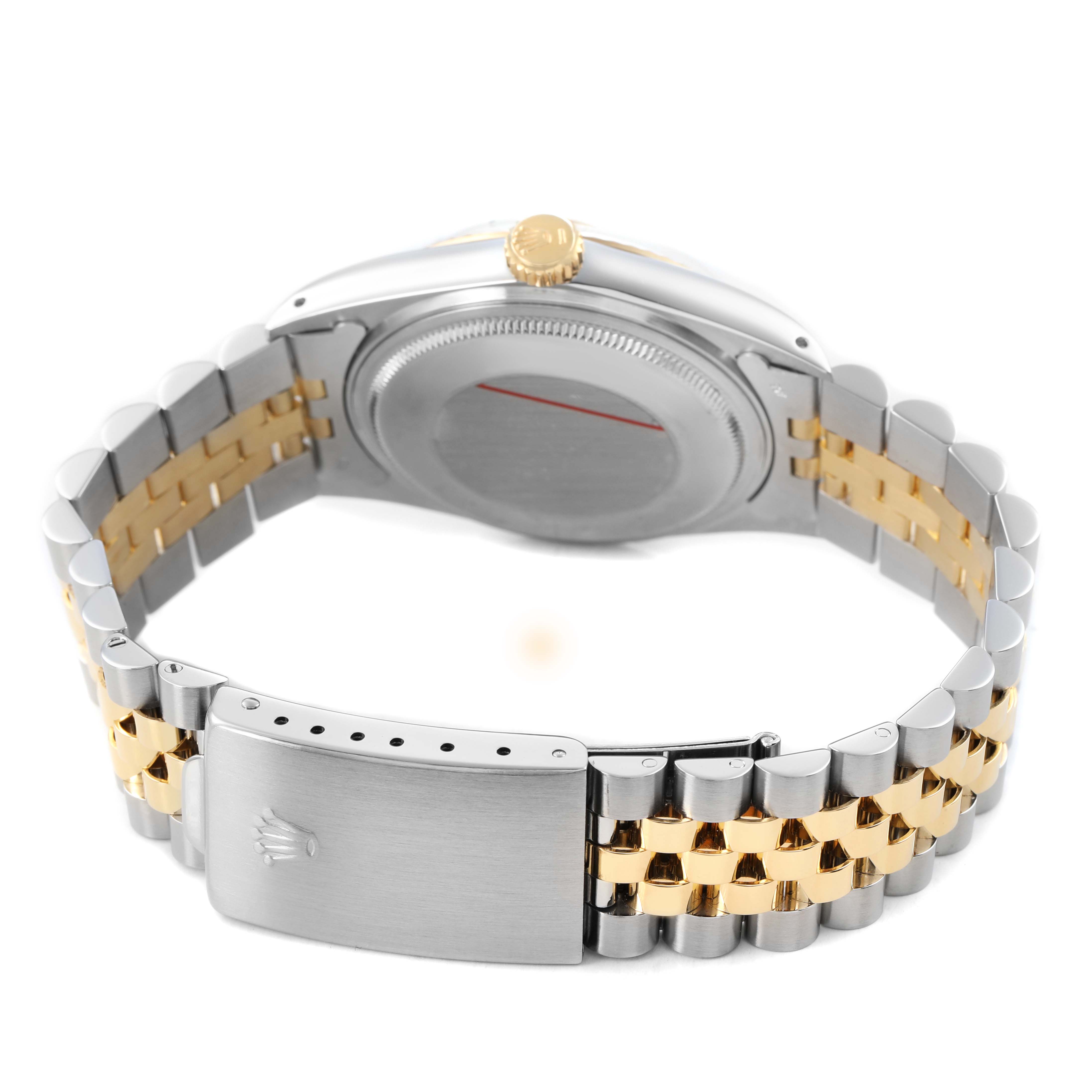 The Rolex Datejust 16013 Men's Steel and Gold (two tone) Champagne Dial watch is shown from the rear, displaying the case back, crown, two-tone bracelet, and clasp.