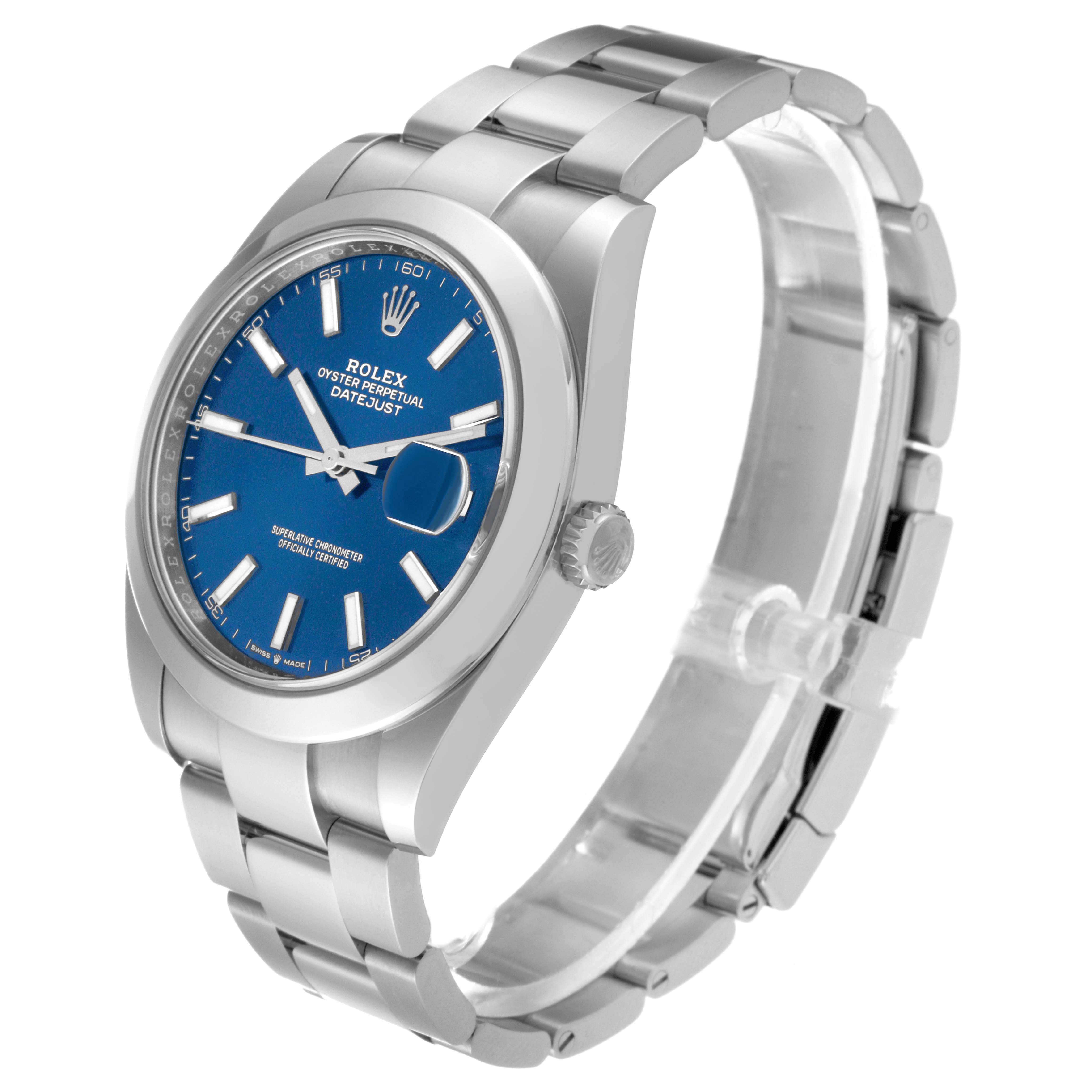 The image shows a Rolex Datejust 41 126300 Men
s Stainless Steel Blue Dial 126300 Men
s Stainless Steel Blue Dial model from an angled side view, highlighting its blue dial, bezel, and bracelet.