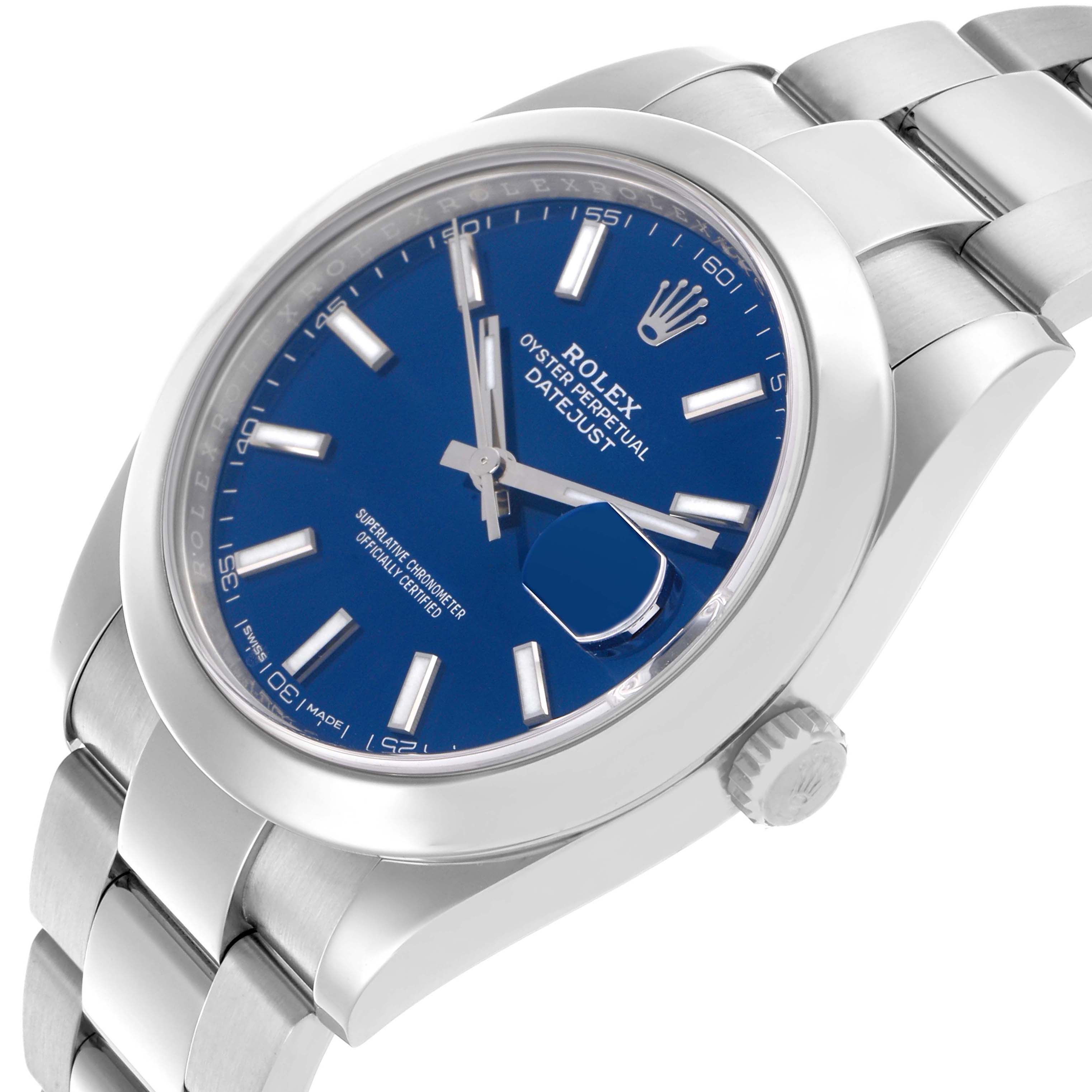 The Rolex Datejust 41 126300 Men
s Stainless Steel Blue Dial 126300 Men
s Stainless Steel Blue Dial watch is shown at an angled side view, highlighting the blue dial, indices, and part of the bracelet.