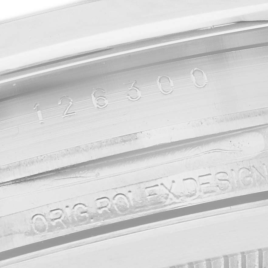 The image shows a close-up of the inner bezel with engravings on a Rolex Datejust 41 126300 Men
s Stainless Steel Blue Dial 126300 Men
s Stainless Steel Blue Dial.