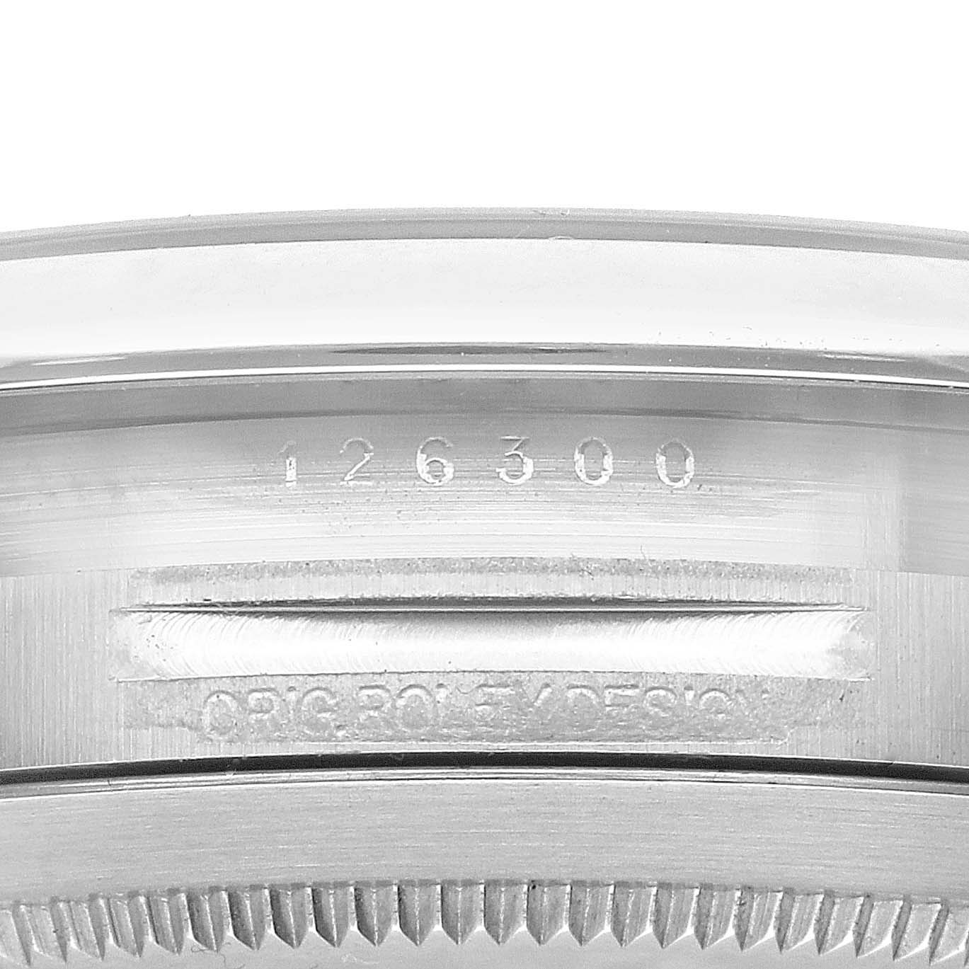 The image shows a close-up of the case back's inner bezel and the engraving on the Rolex Datejust 41 126300 Men's Stainless Steel Grey Dial 126300 Men's Stainless Steel Grey Dial watch.