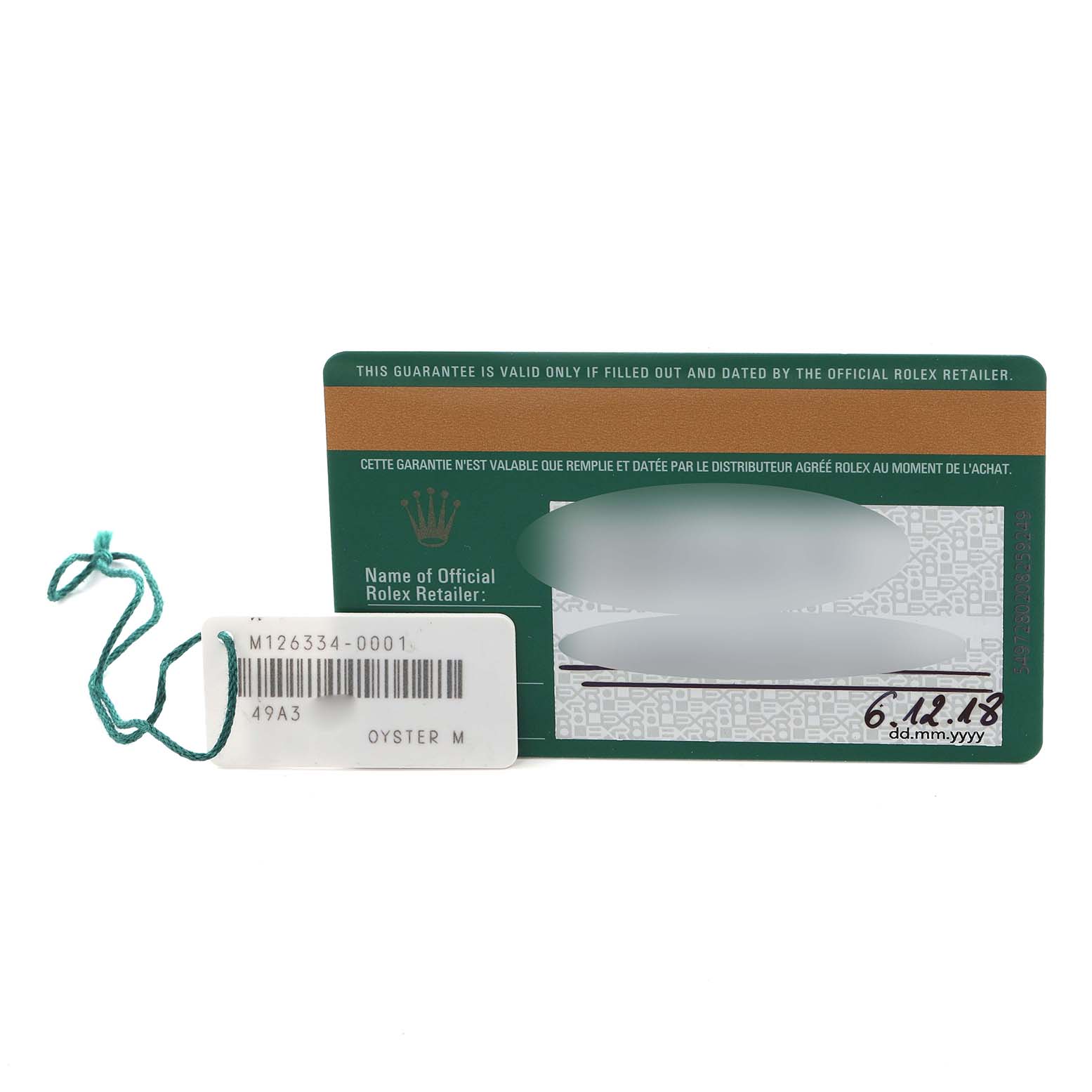 The image shows a Rolex warranty card and a tag for the Datejust 41 model, with the barcode and reference number visible.