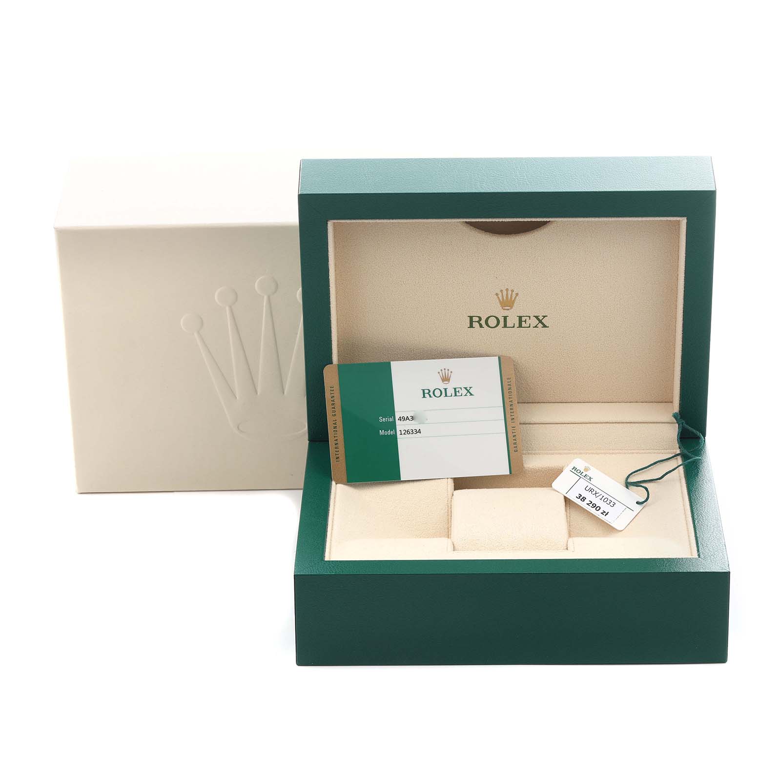 The image shows the packaging and accessories for a Rolex Datejust 41 126334 Men's Stainless Steel Blue Dial 126334 Men's Stainless Steel Blue Dial, including an empty watch box, warranty card, and hang tag.