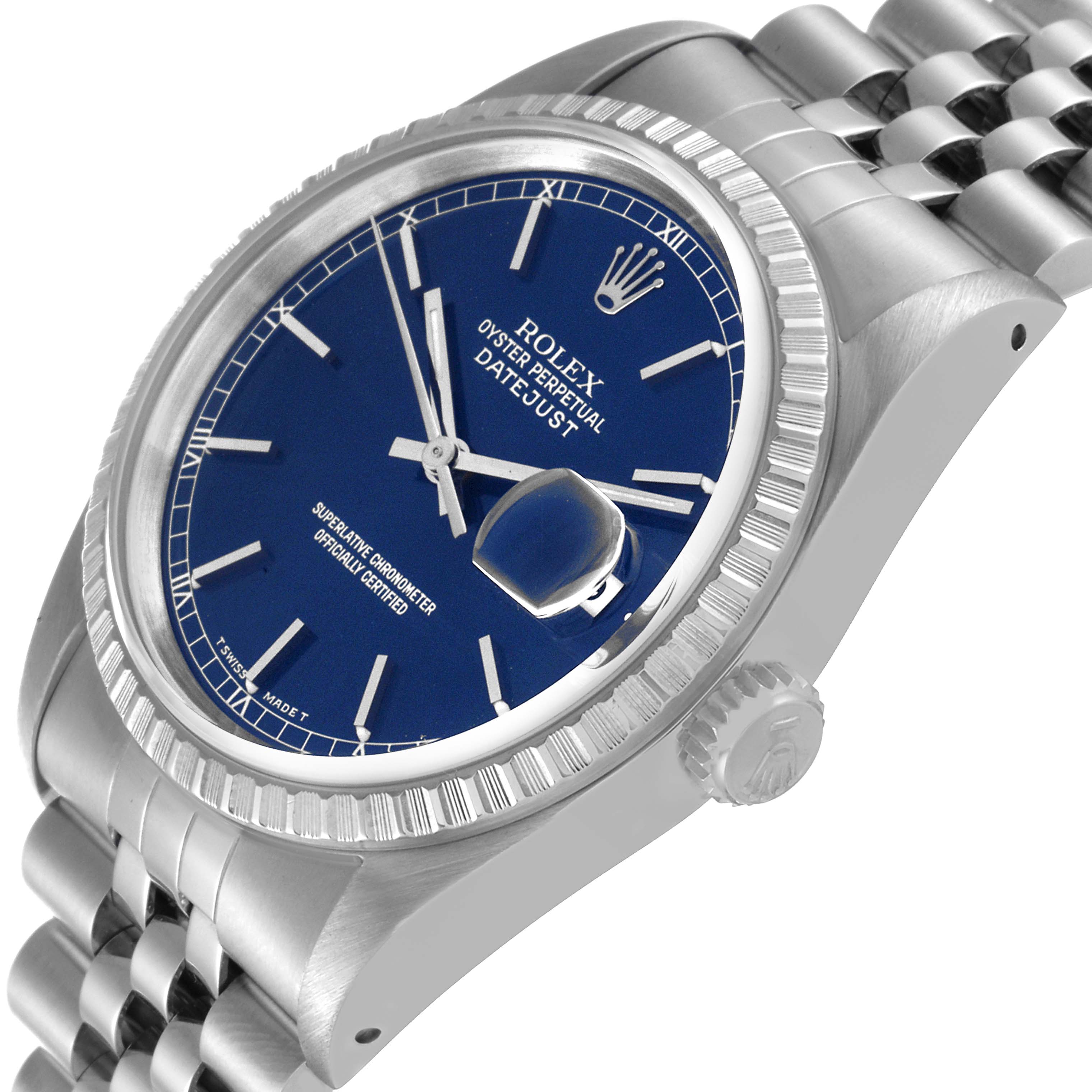 The image shows a close-up, angled view of the Rolex Datejust 16220 Men's Stainless Steel Blue Dial 16220 Men's Stainless Steel Blue Dial, focusing on its blue dial, fluted bezel, crown, and part of the jubilee bracelet.