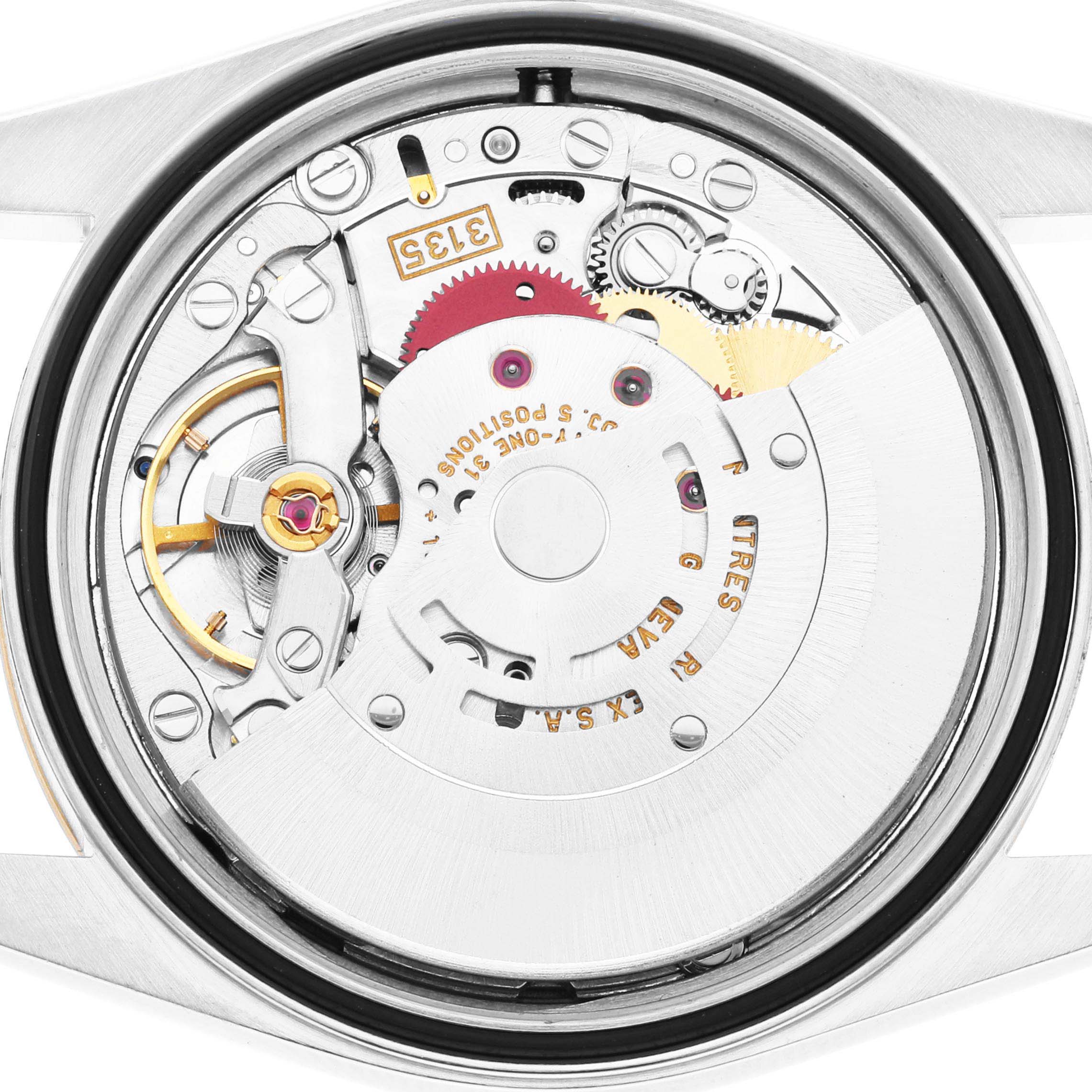 The image shows the intricate inner mechanism of a Rolex Datejust 16233 Men's Steel and Gold (two tone) Champagne Dial 16233 Men's Steel and Gold (two tone) Champagne Dial watch from the back view.