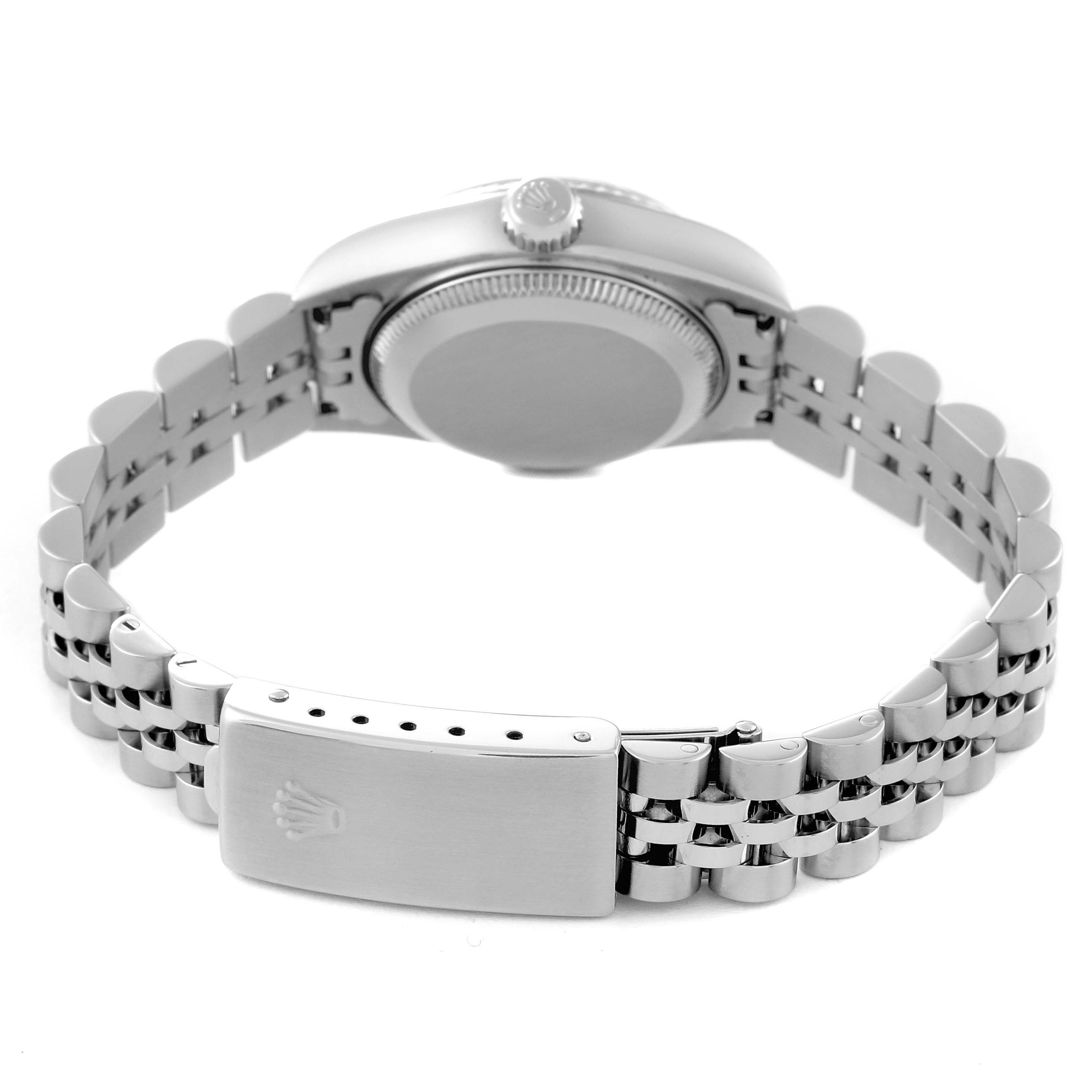 This image shows the back of a Rolex Datejust 79174 Women's Stainless Steel White Dial 79174 Women's Stainless Steel White Dial watch, highlighting the case, crown, and jubilee bracelet with the clasp open.