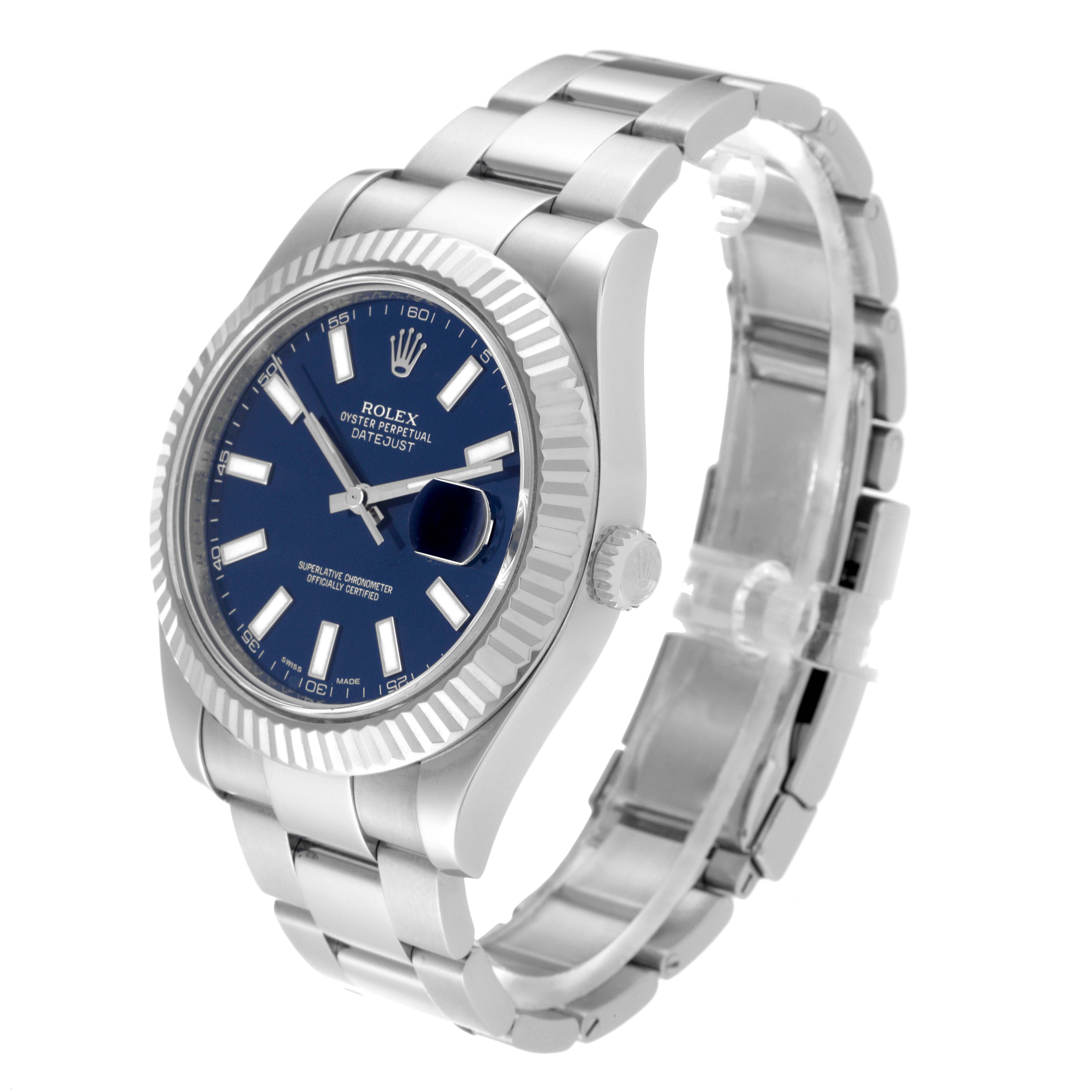 The Rolex Datejust 41 116334 Men
s Stainless Steel Blue Dial 116334 Men
s Stainless Steel Blue Dial is shown at a slight angle, displaying its blue dial, fluted bezel, and stainless steel bracelet.