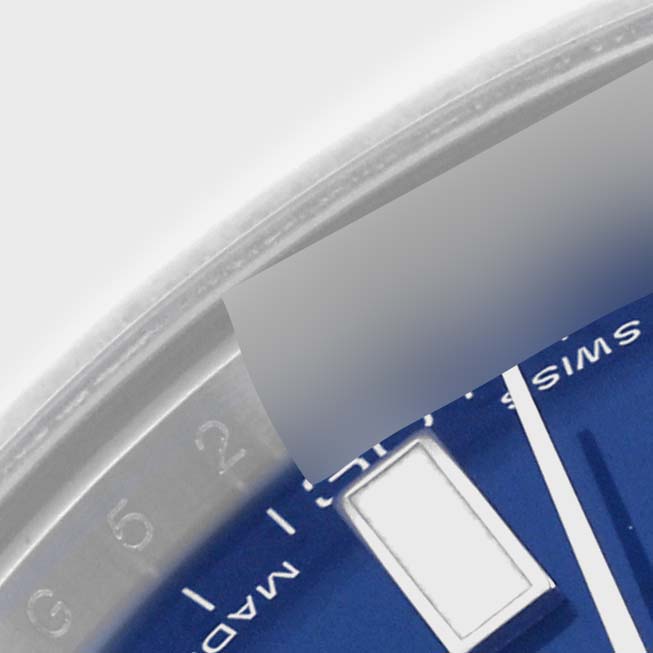The image shows a close-up of the dial and part of the bezel of a Rolex Datejust 41 116334 Men
s Stainless Steel Blue Dial 116334 Men
s Stainless Steel Blue Dial, highlighting a marker and text detail.