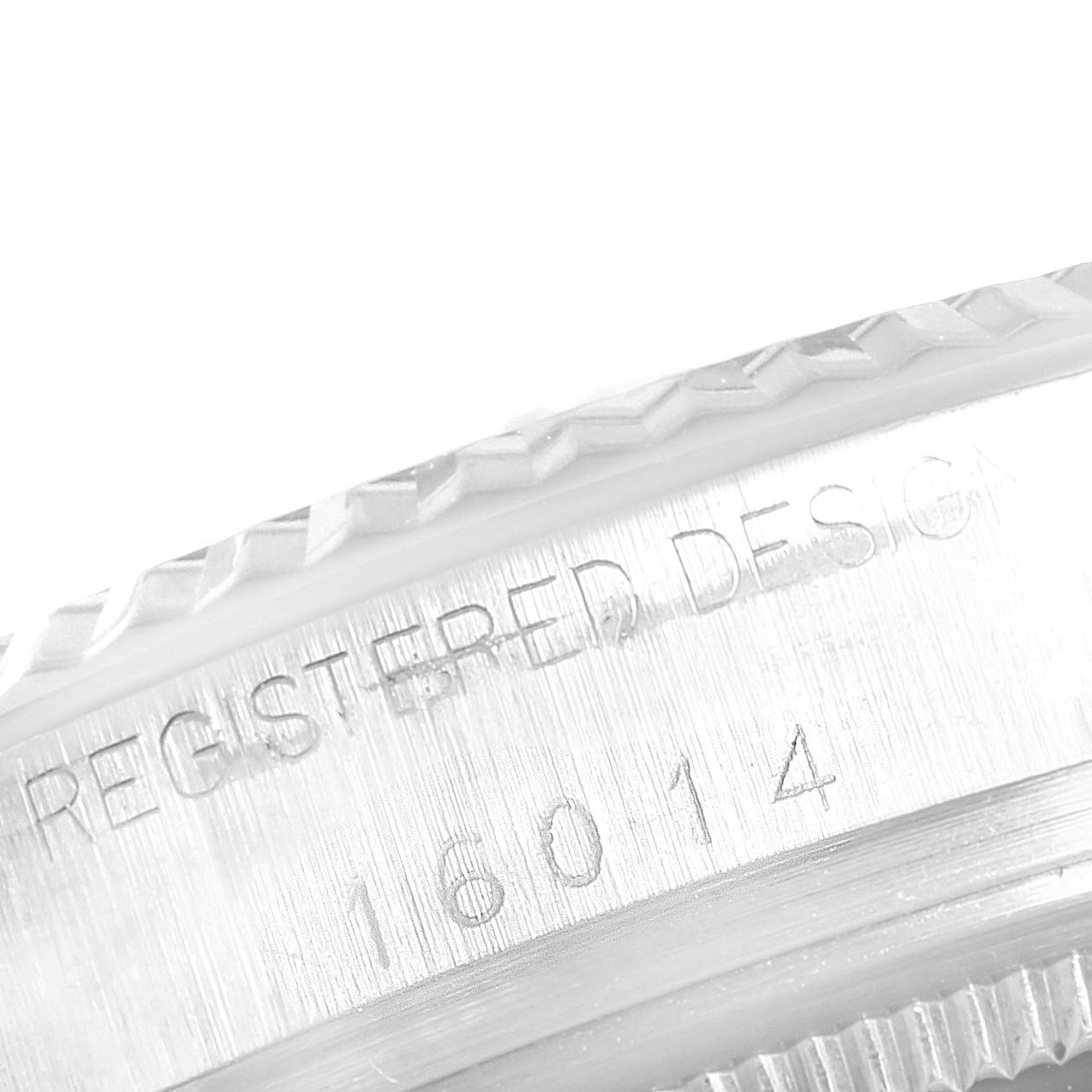 This image shows a close-up of the engraved case part with the model number on the Rolex Vintage Collection 16014 Men
s Stainless Steel Silver Dial 16014 Men
s Stainless Steel Silver Dial watch.