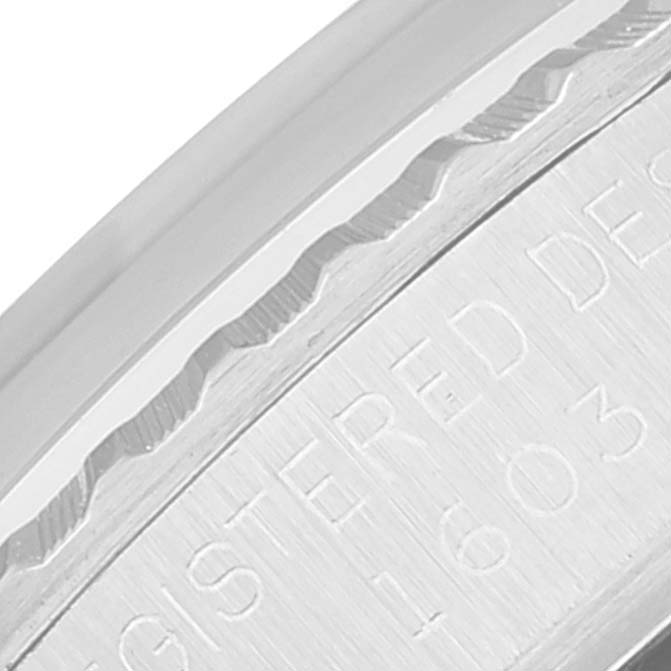 The image shows a close-up of the side of a Vintage Collection Rolex watch, displaying part of the model number and case details.