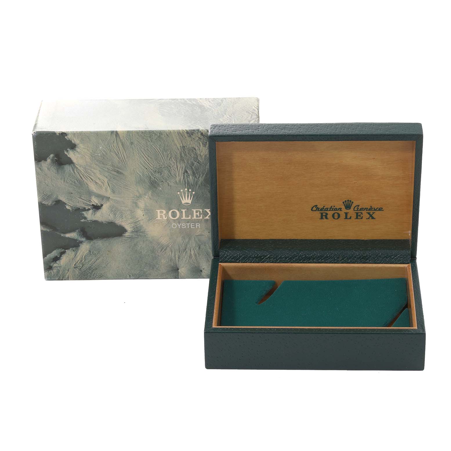 The image shows an open Rolex Vintage Collection 16014 Men
s Stainless Steel Silver Dial 16014 Men
s Stainless Steel Silver Dial watch box with a green interior and the outer packaging beside it.