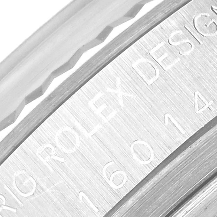 The image shows a close-up of the model number and design engraving on the side of a Rolex Vintage Collection 16014 Men
s Stainless Steel Silver Dial 16014 Men
s Stainless Steel Silver Dial watch.