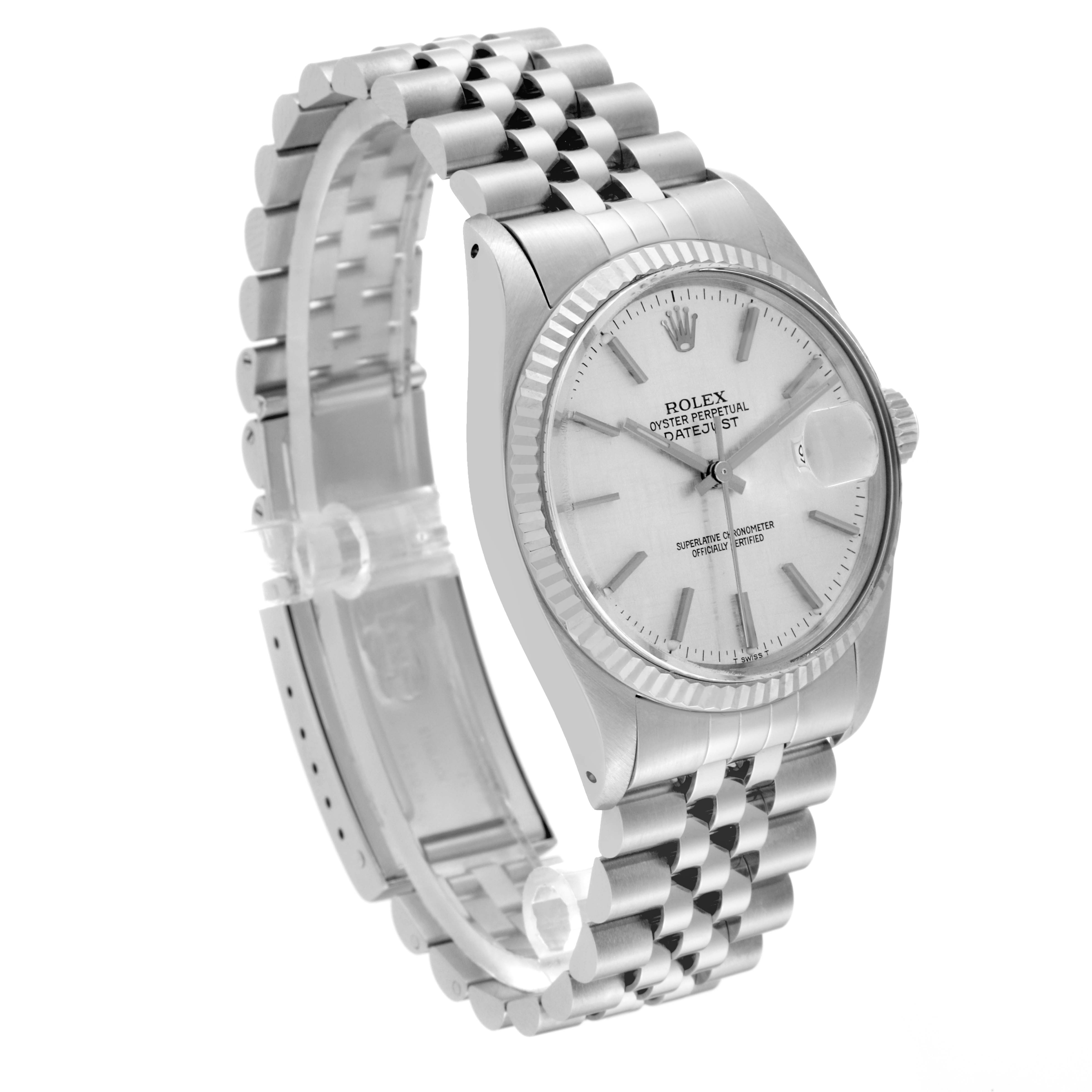 The Vintage Collection Rolex watch is shown at a three-quarter angle, highlighting the watch face, bezel, and Jubilee bracelet.