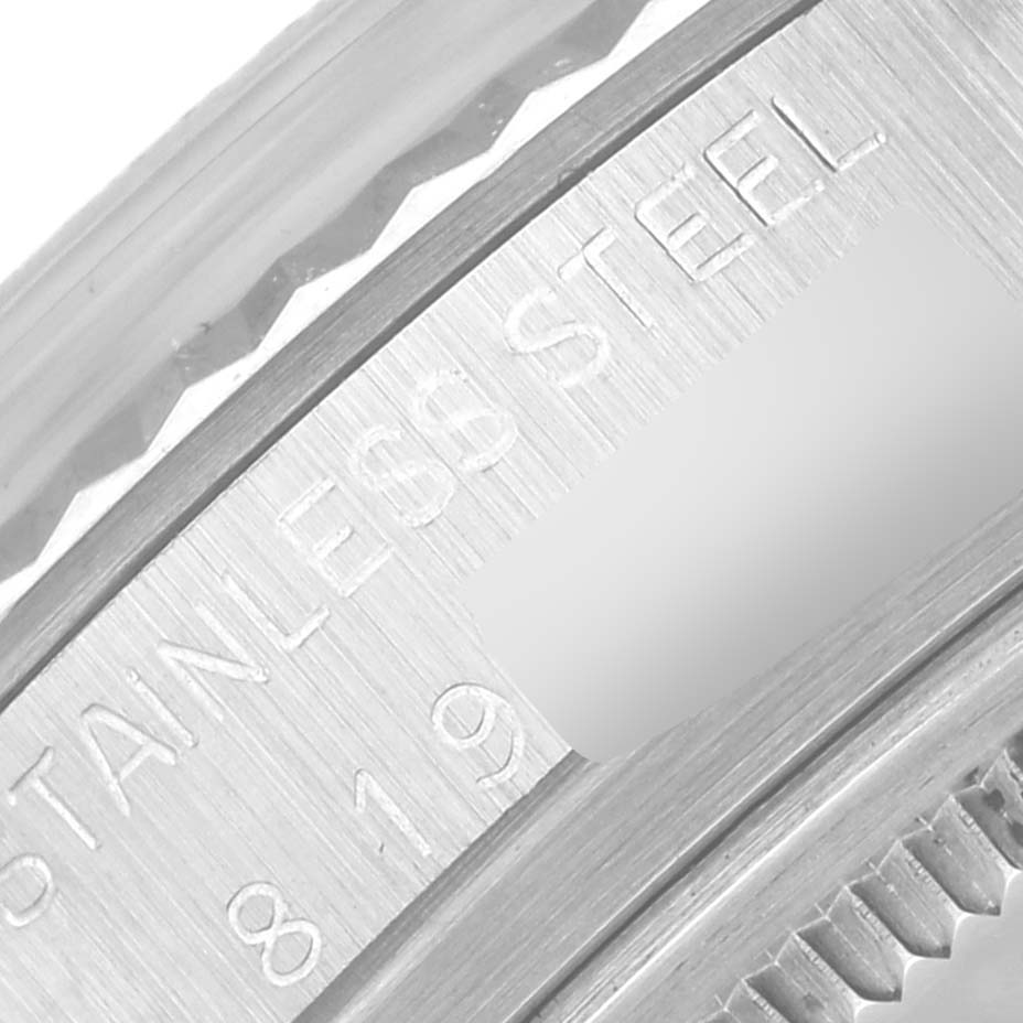 The image displays a close-up view of the casing and engraving of a Rolex Vintage Collection 16014 Men
s Stainless Steel Silver Dial 16014 Men
s Stainless Steel Silver Dial watch in stainless steel.